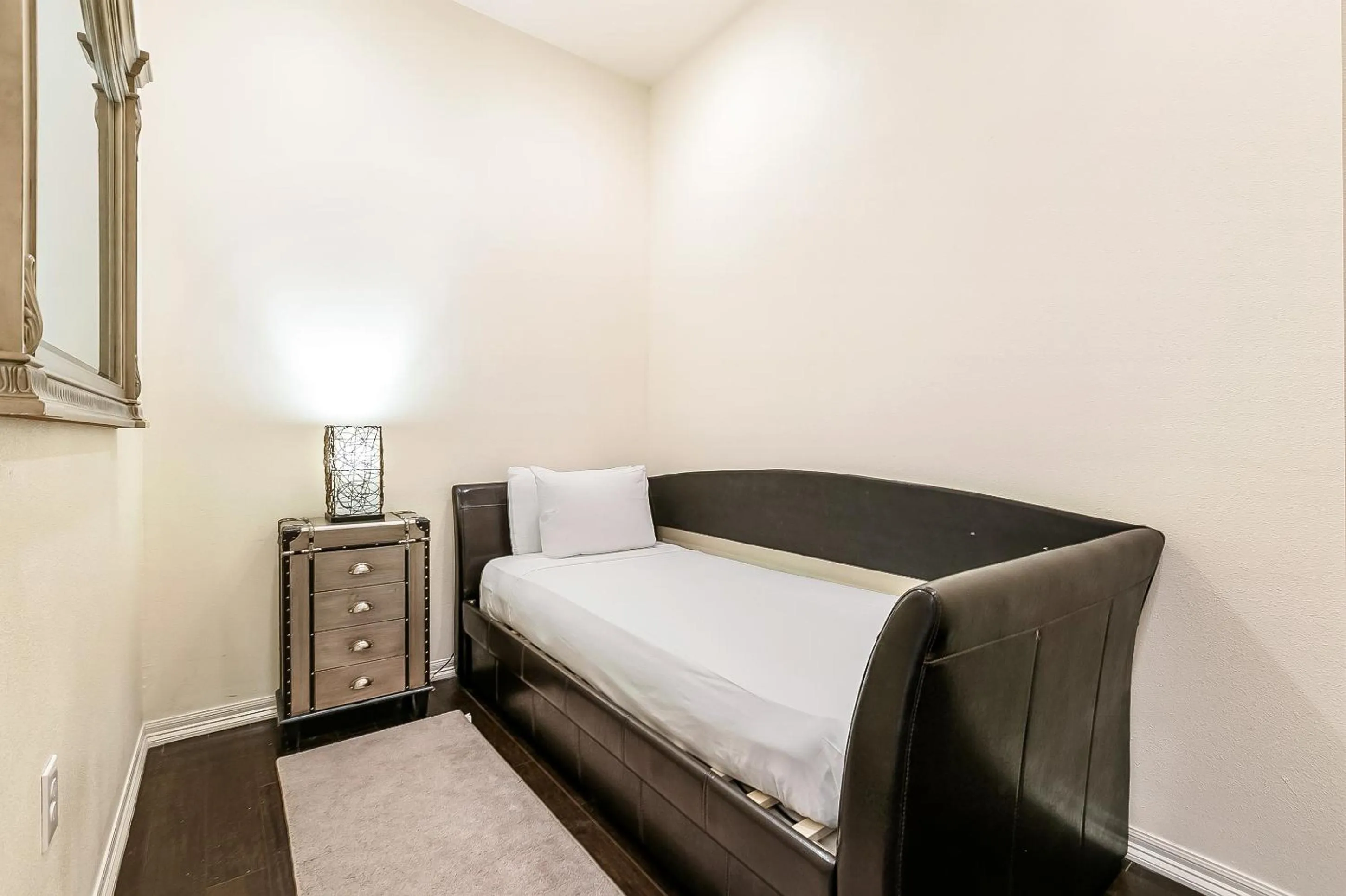 Seating area, Bed in Modern, Spacious Condos with Luxury Amenities