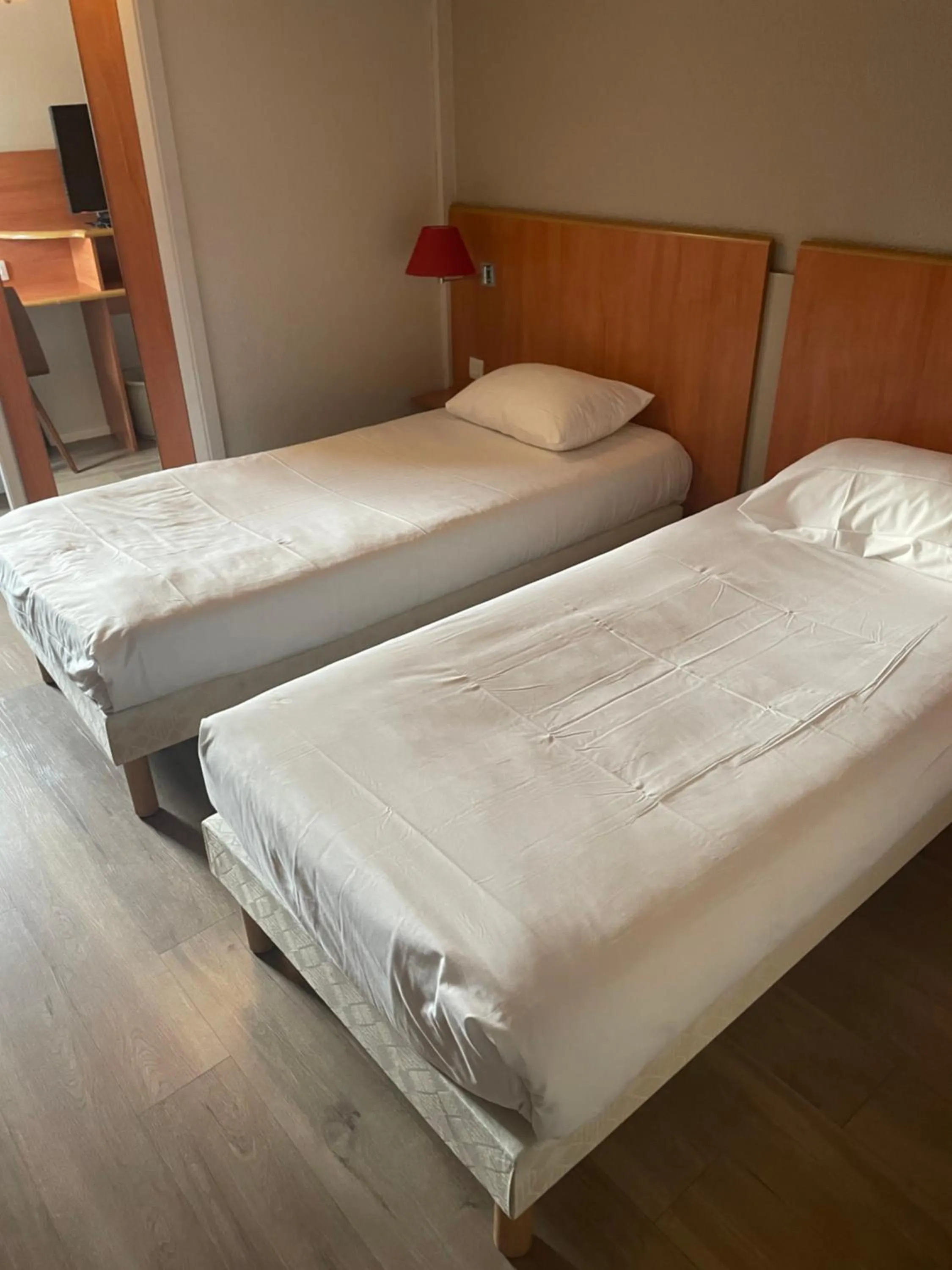 Bed in Hôtel inn design Sancé