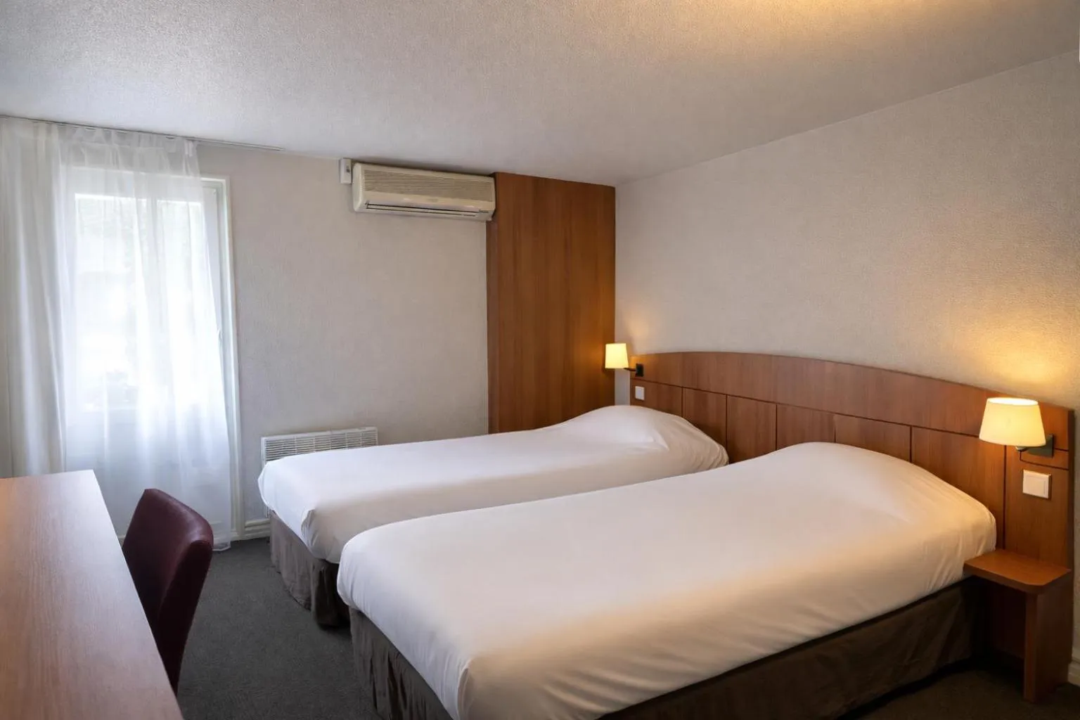 Photo of the whole room, Bed in Kyriad Montargis Amilly