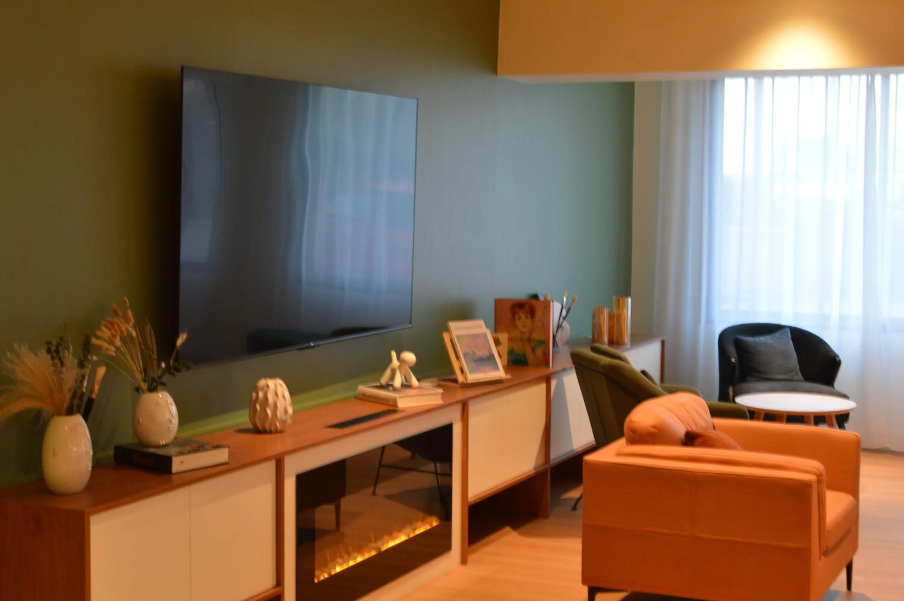 Communal lounge/ TV room in Kyriad Argenteuil