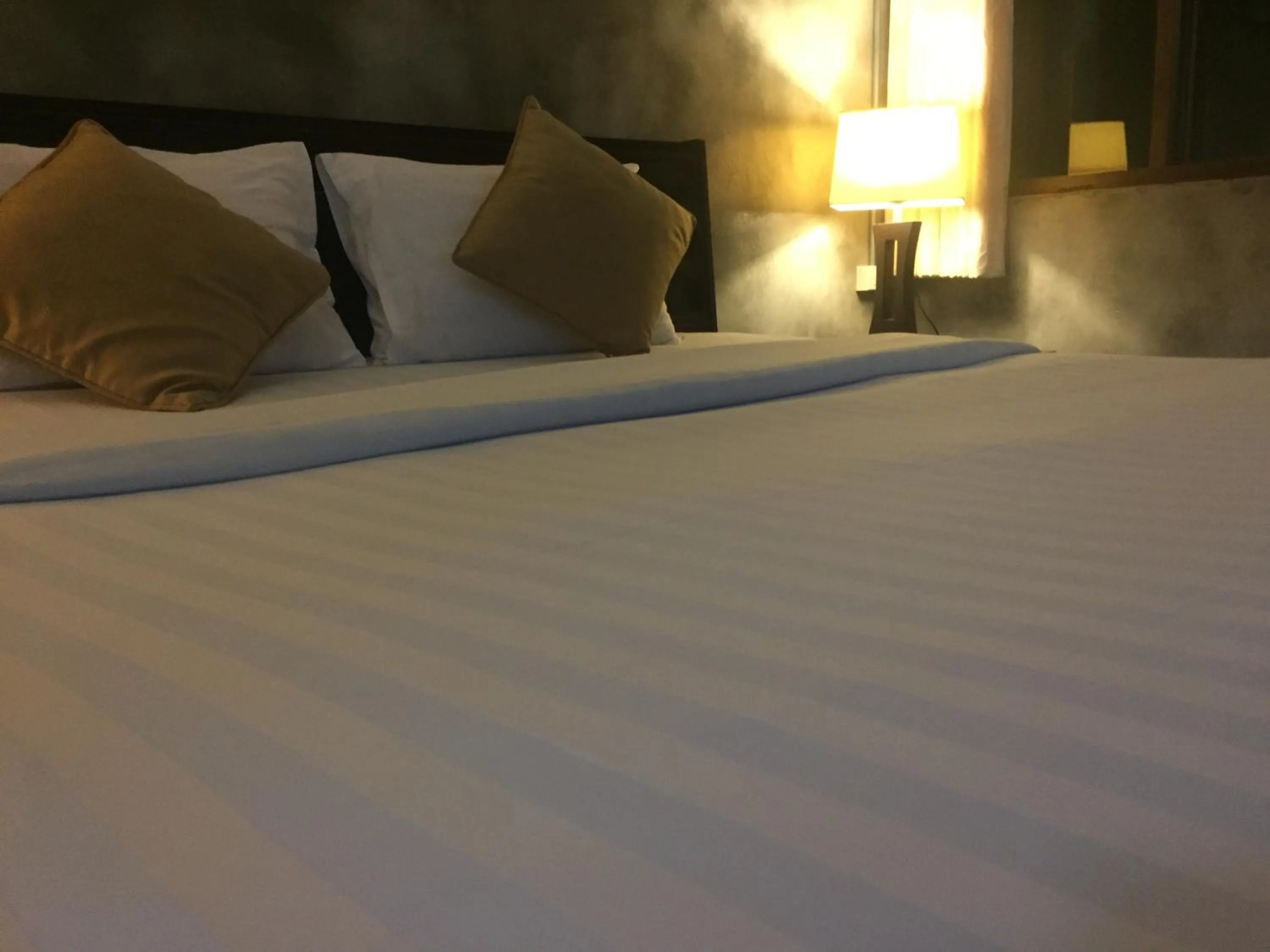 Bed in Crescent Bay Resort