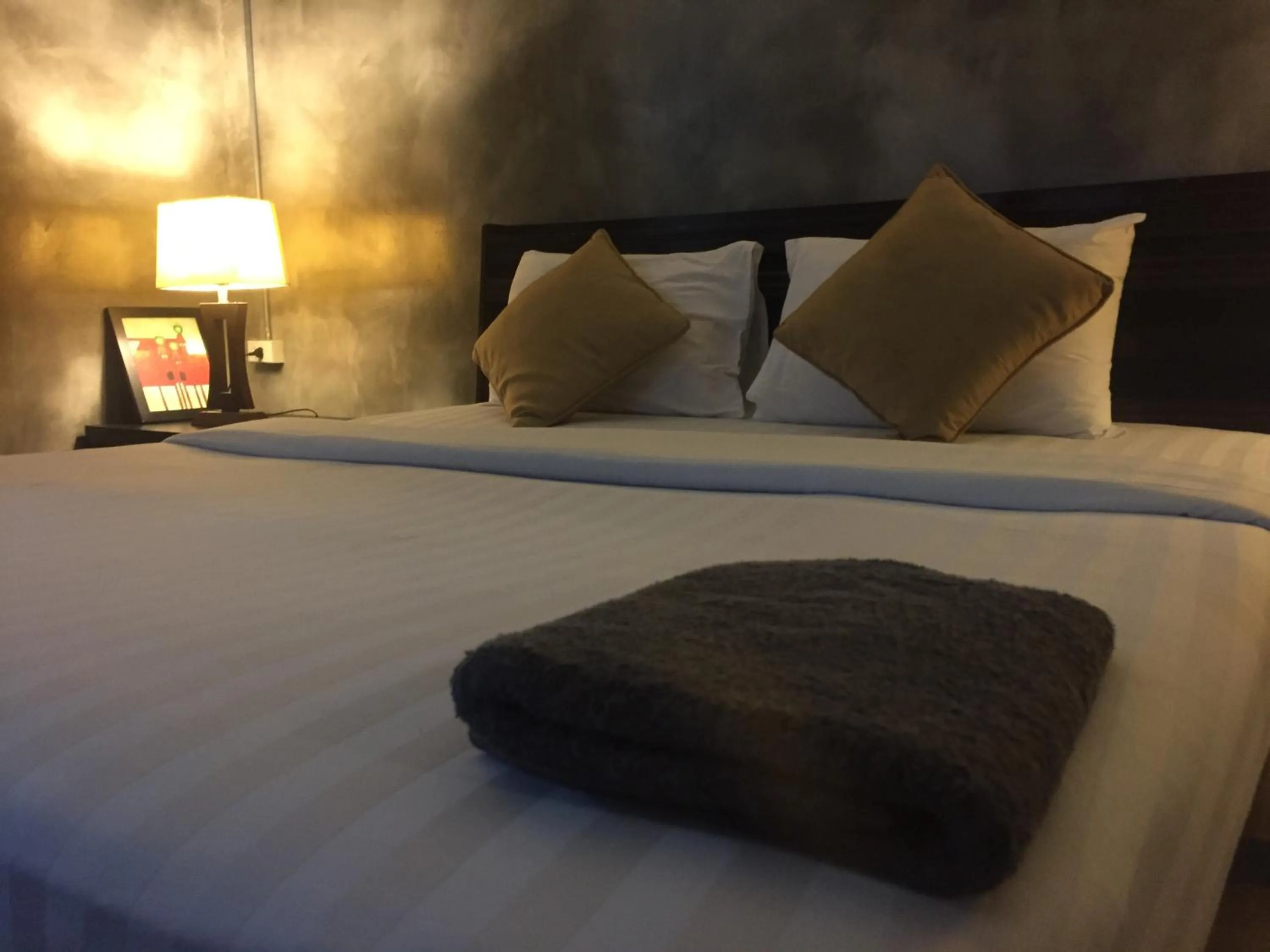 Bed in Crescent Bay Resort