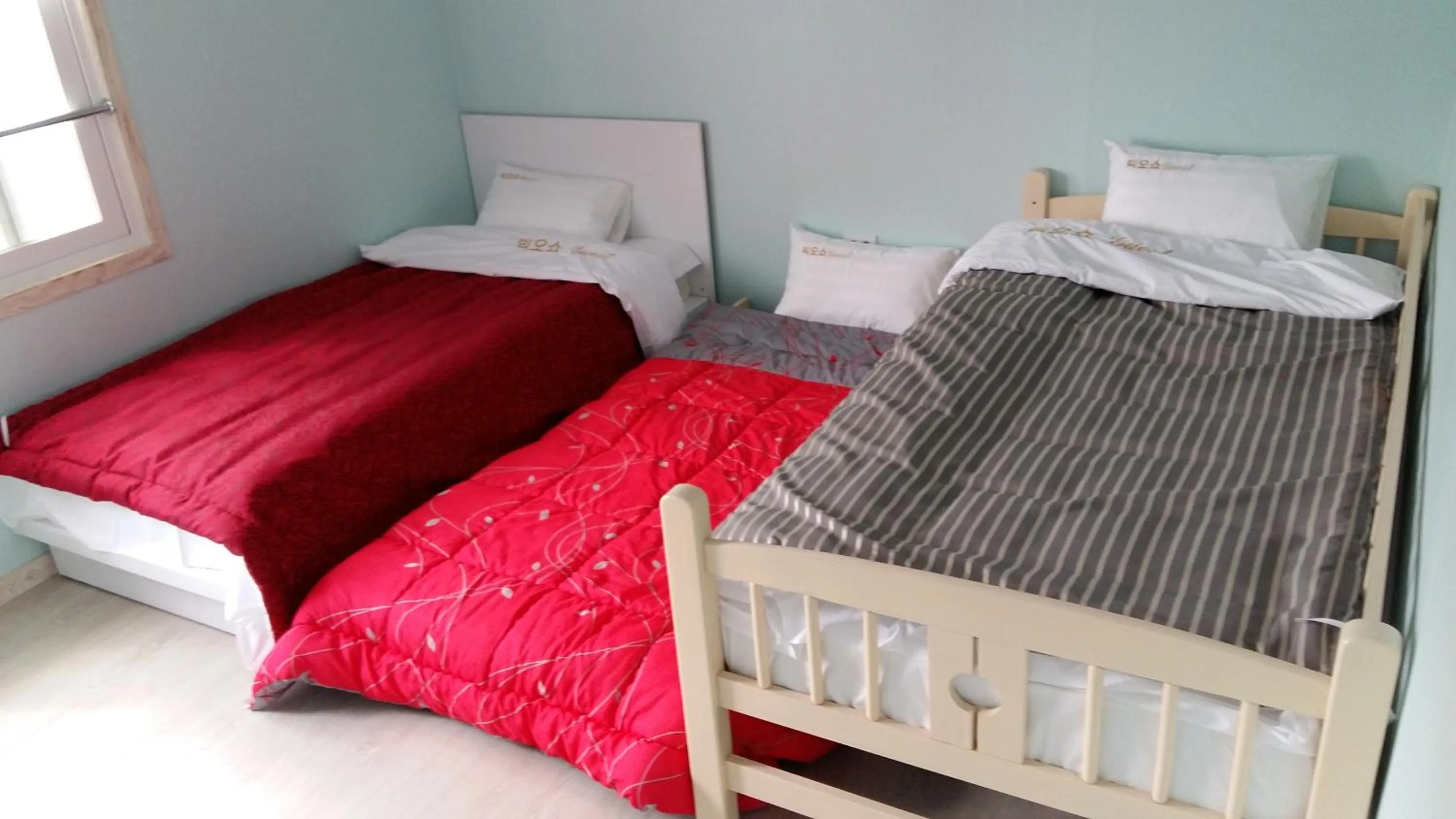 Bed in Big O Show Guesthouse