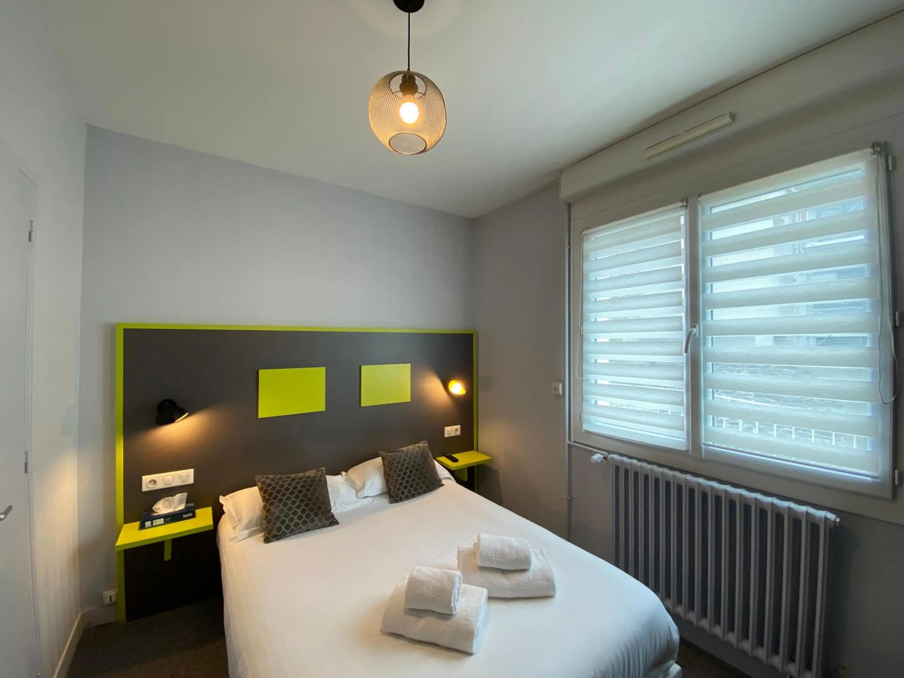 Bed in Hôtel du Musée