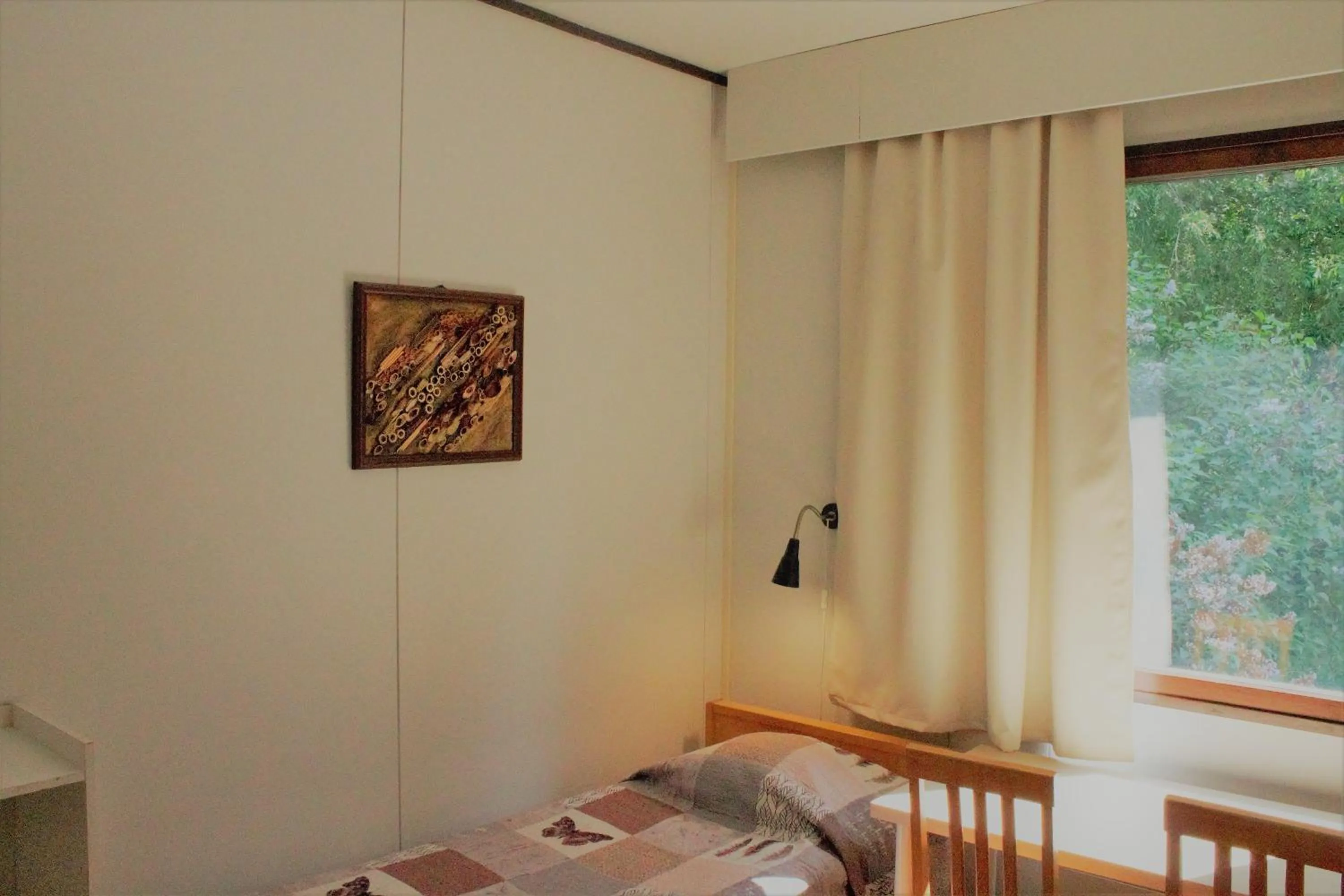 Decorative detail, Bed in Guesthouse - Kuin Kotonaan