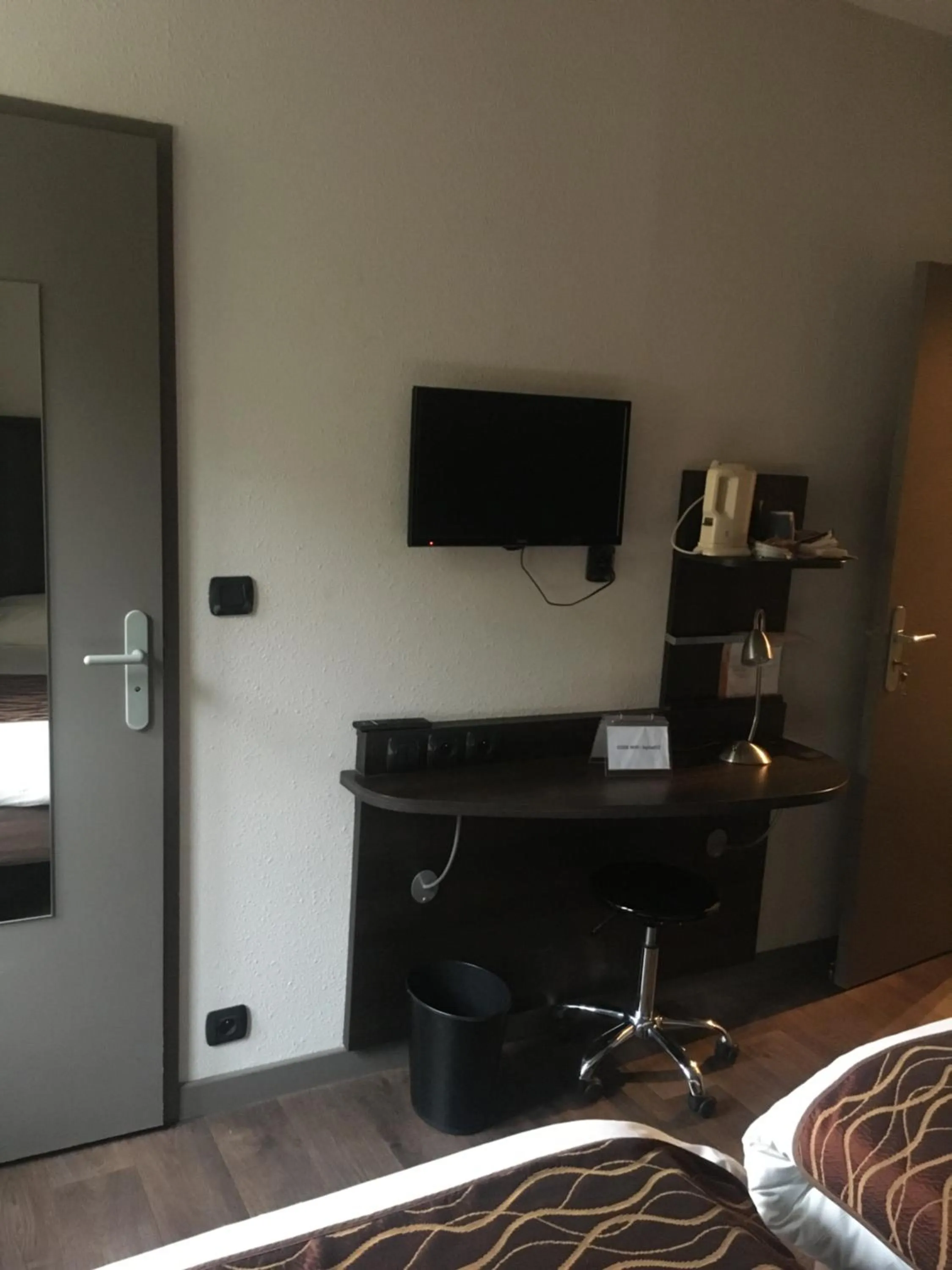 View (from property/room), Bed in Kyriad Rodez