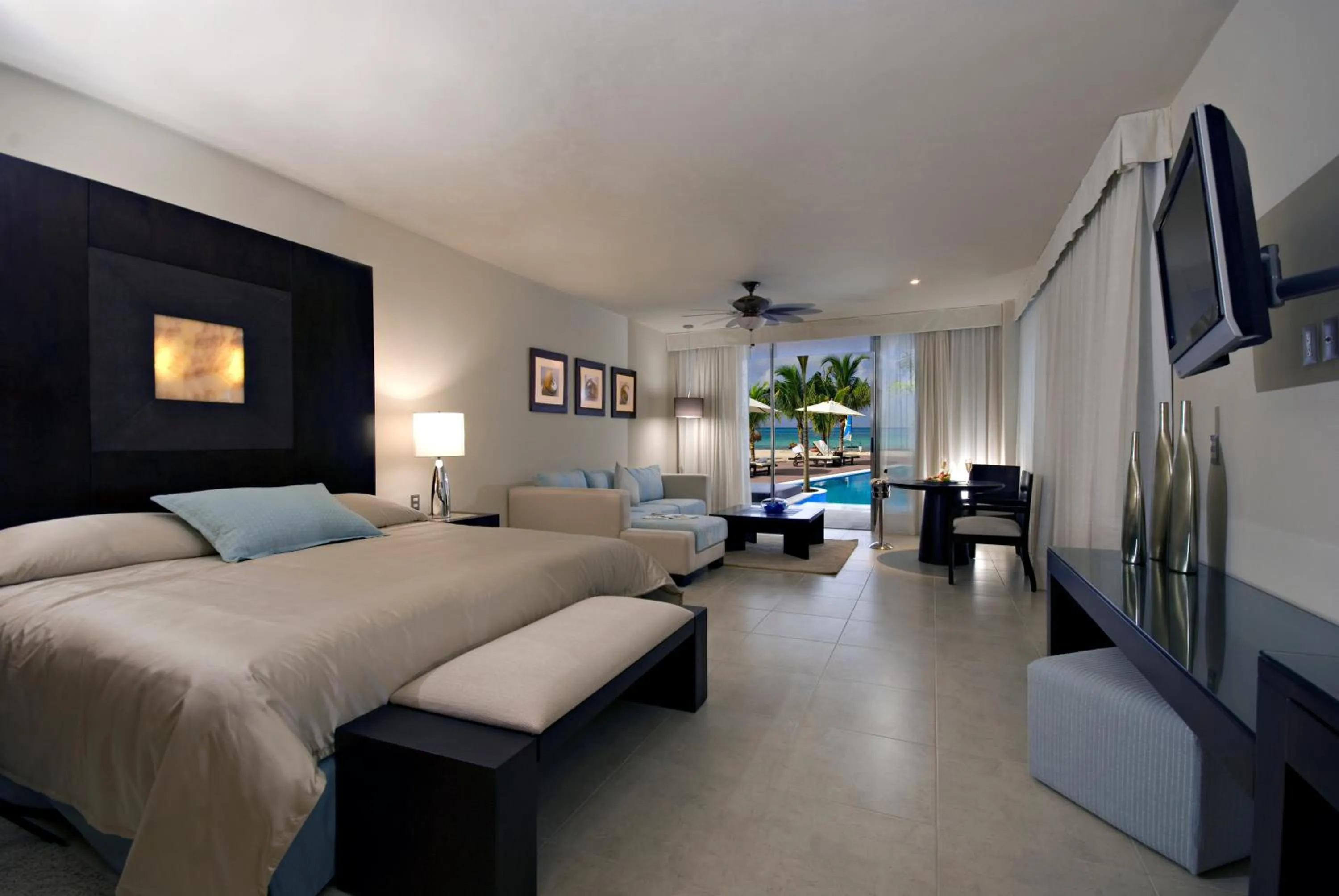 Photo of the whole room, Bed in Secrets Aura Cozumel - Adults Only