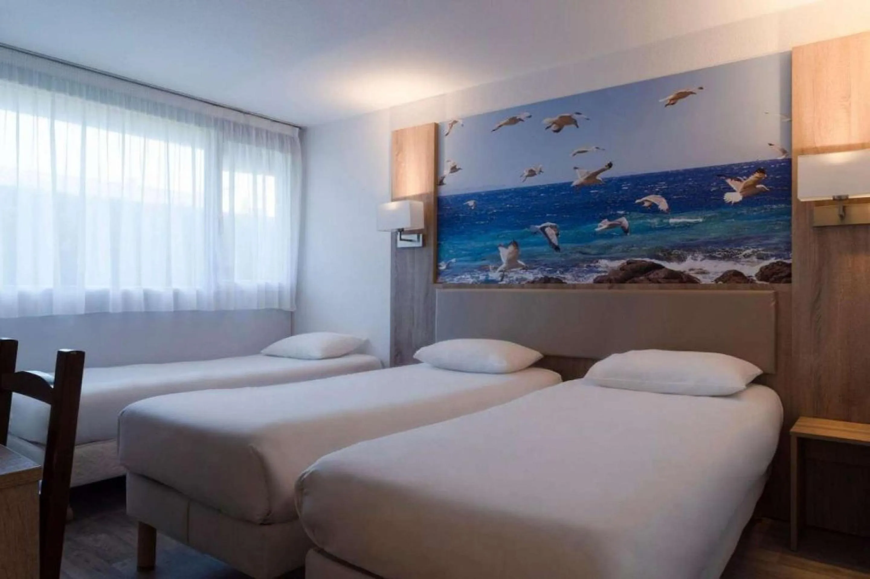 Bedroom, Bed in BRIT HOTEL Confort MORLAIX