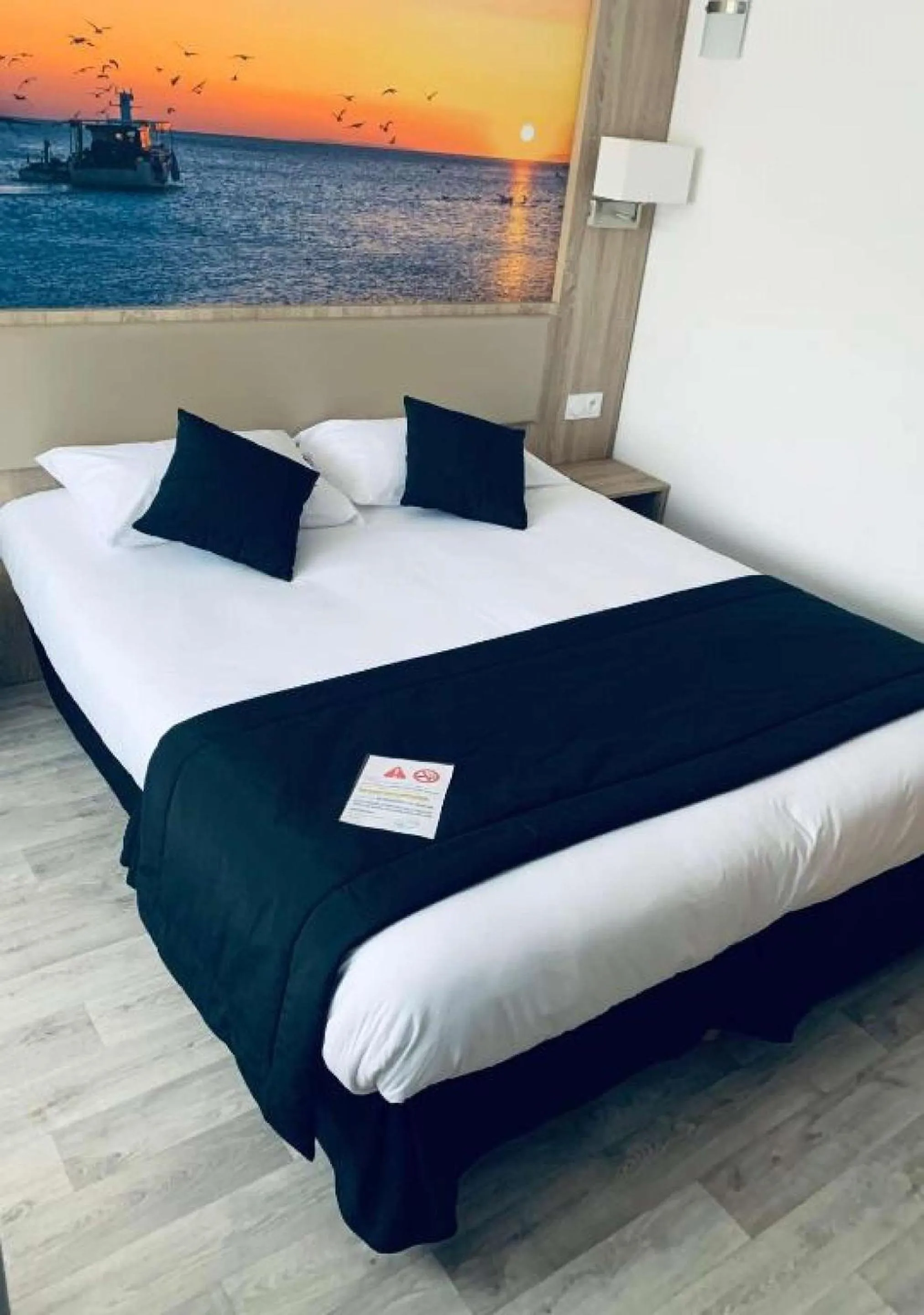 Bedroom, Bed in BRIT HOTEL Confort MORLAIX