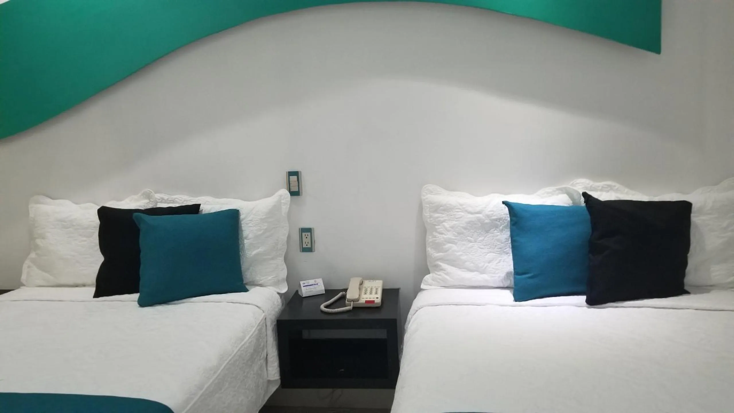 Bedroom in Hotel Dluxe