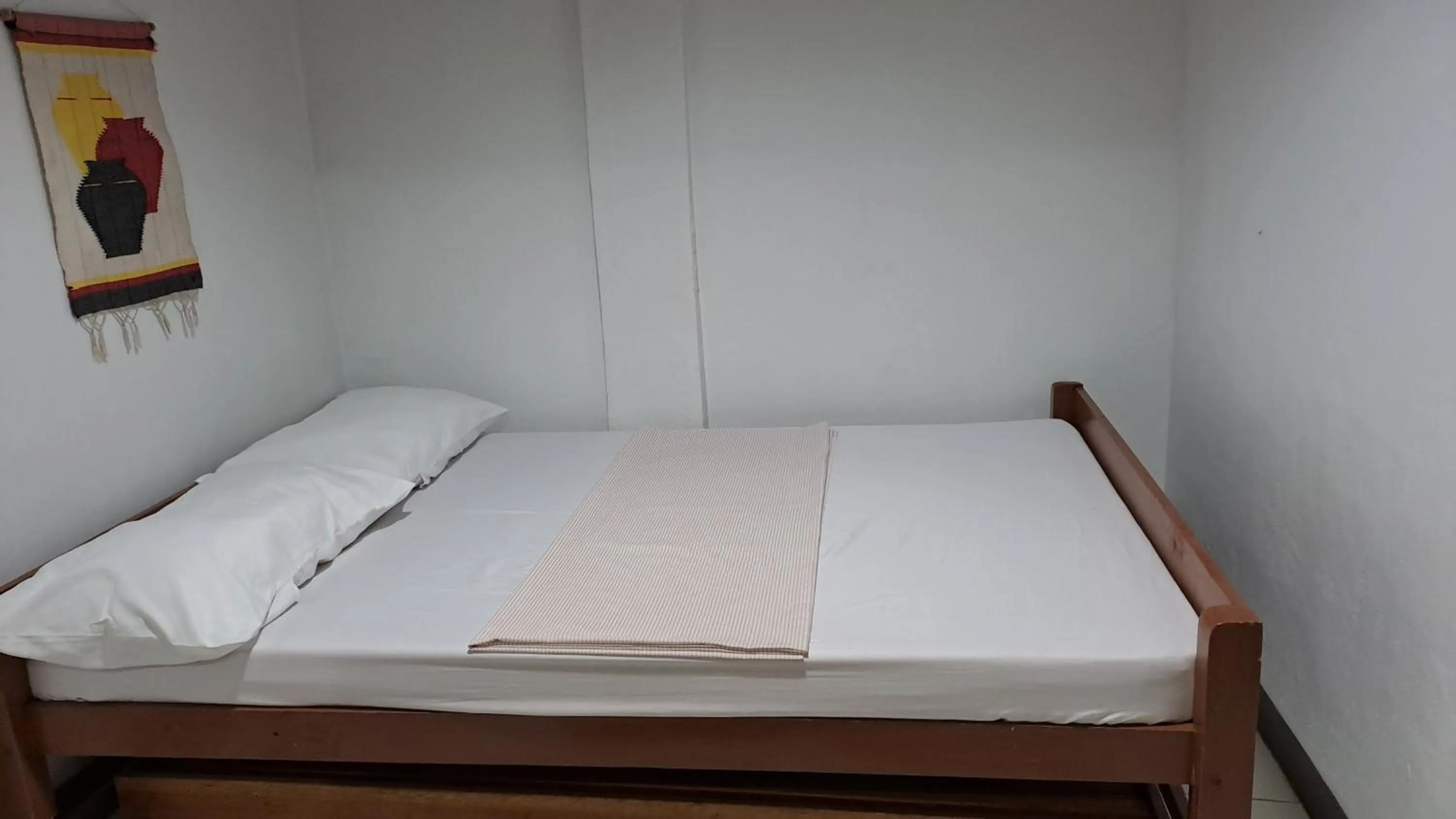 Bed in Dalinda's Homestay