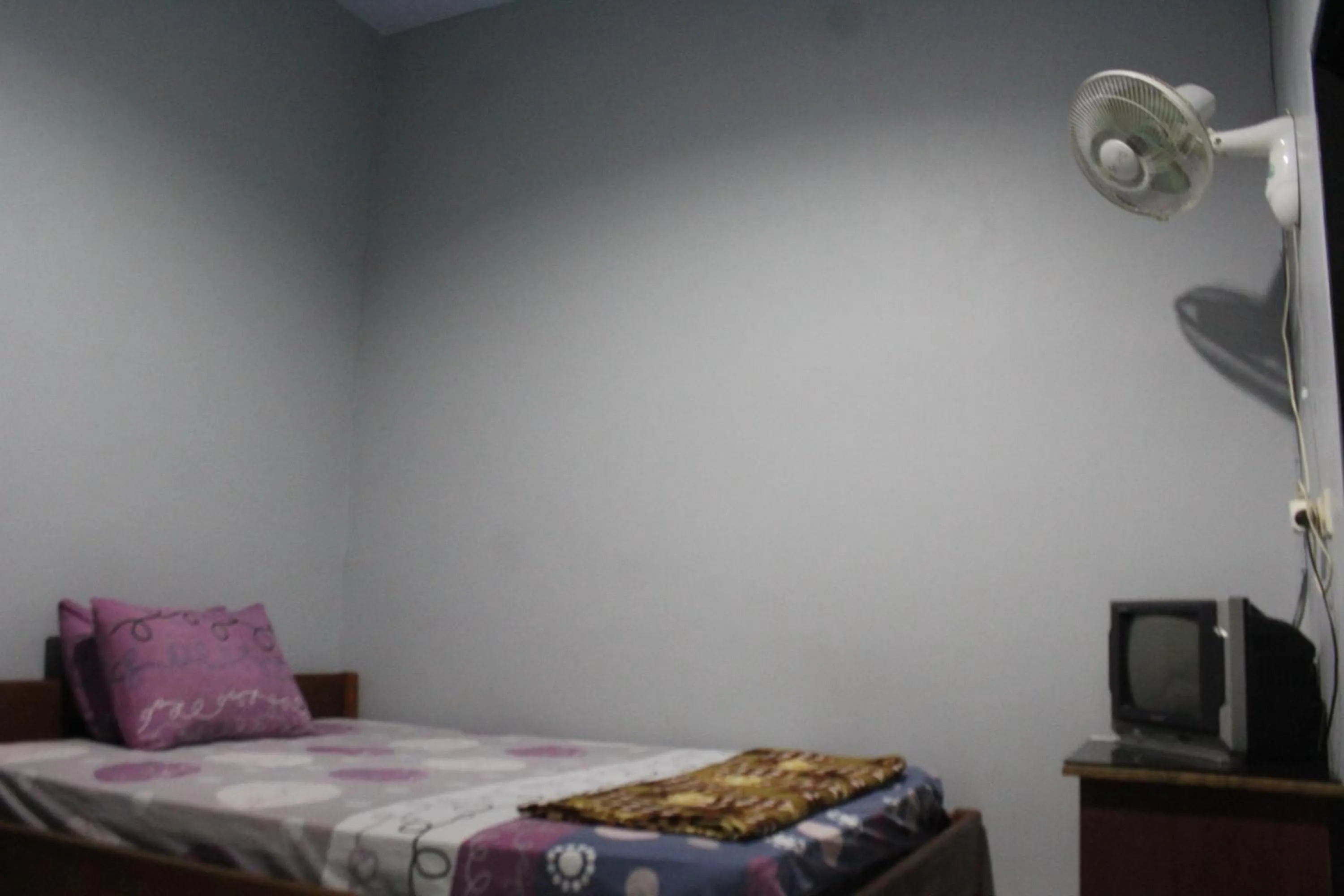 Bed in Penginapan Artha