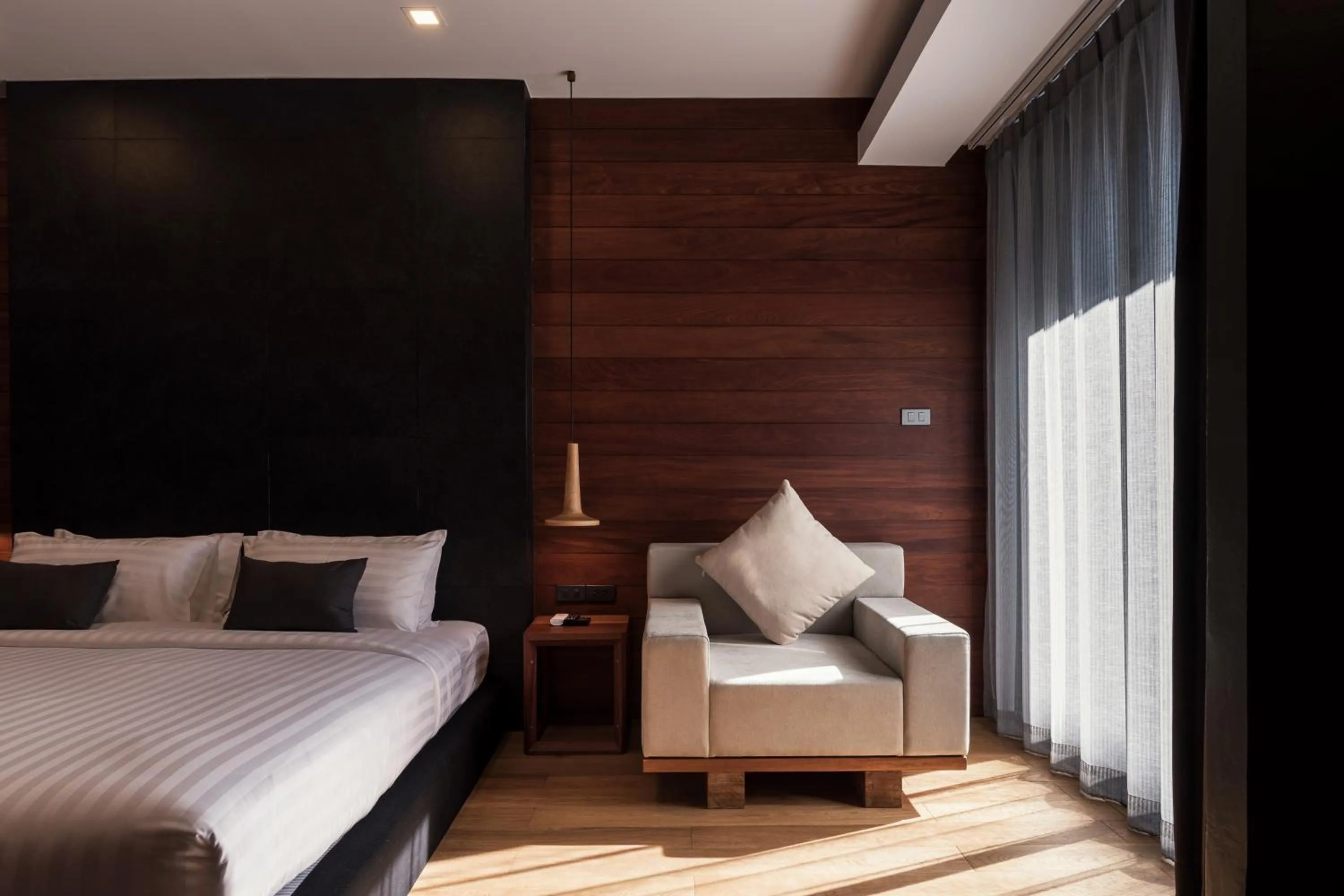Seating area, Bed in The Habita Hatyai