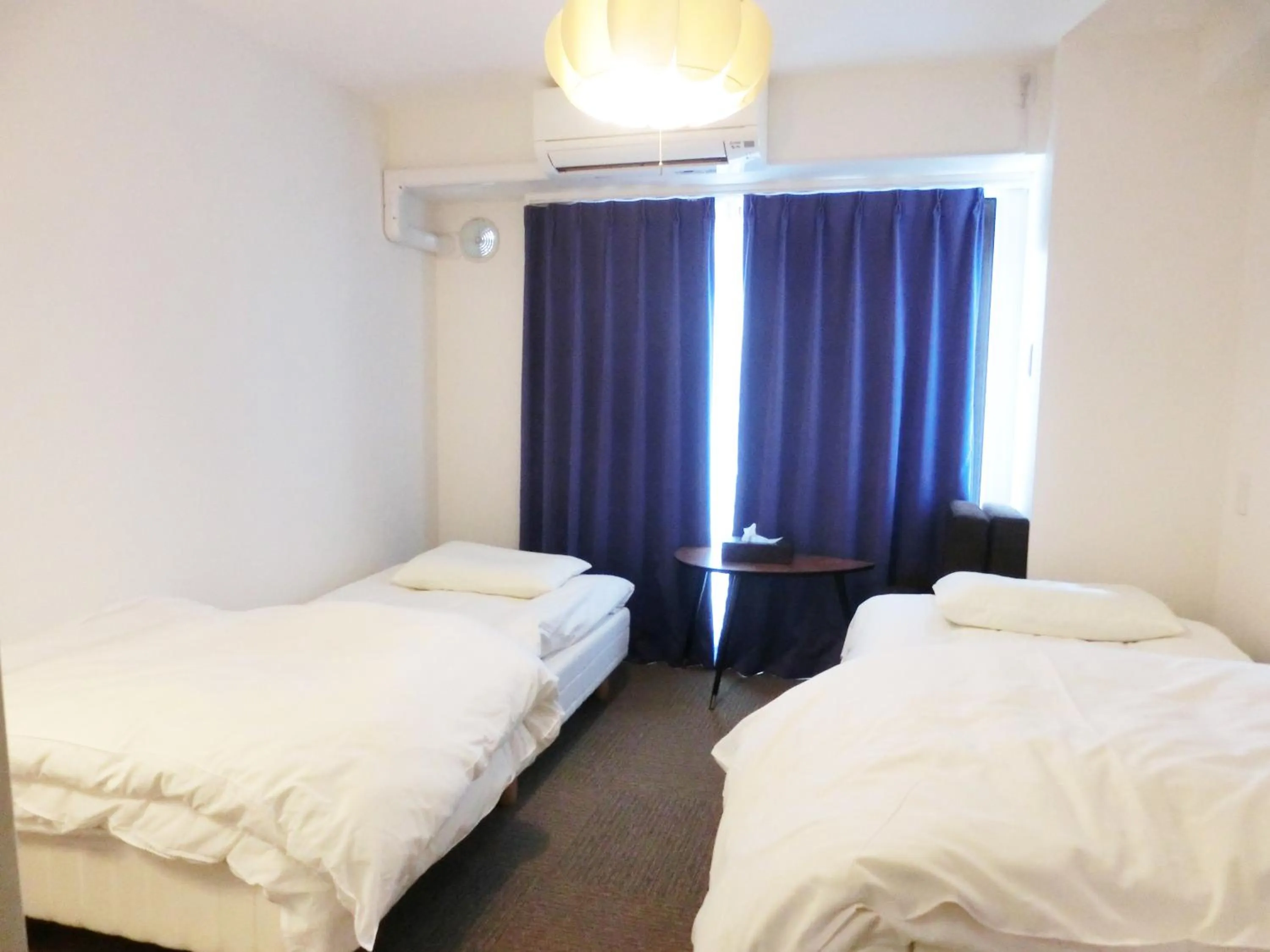 Bed in Guesthouse TOHO