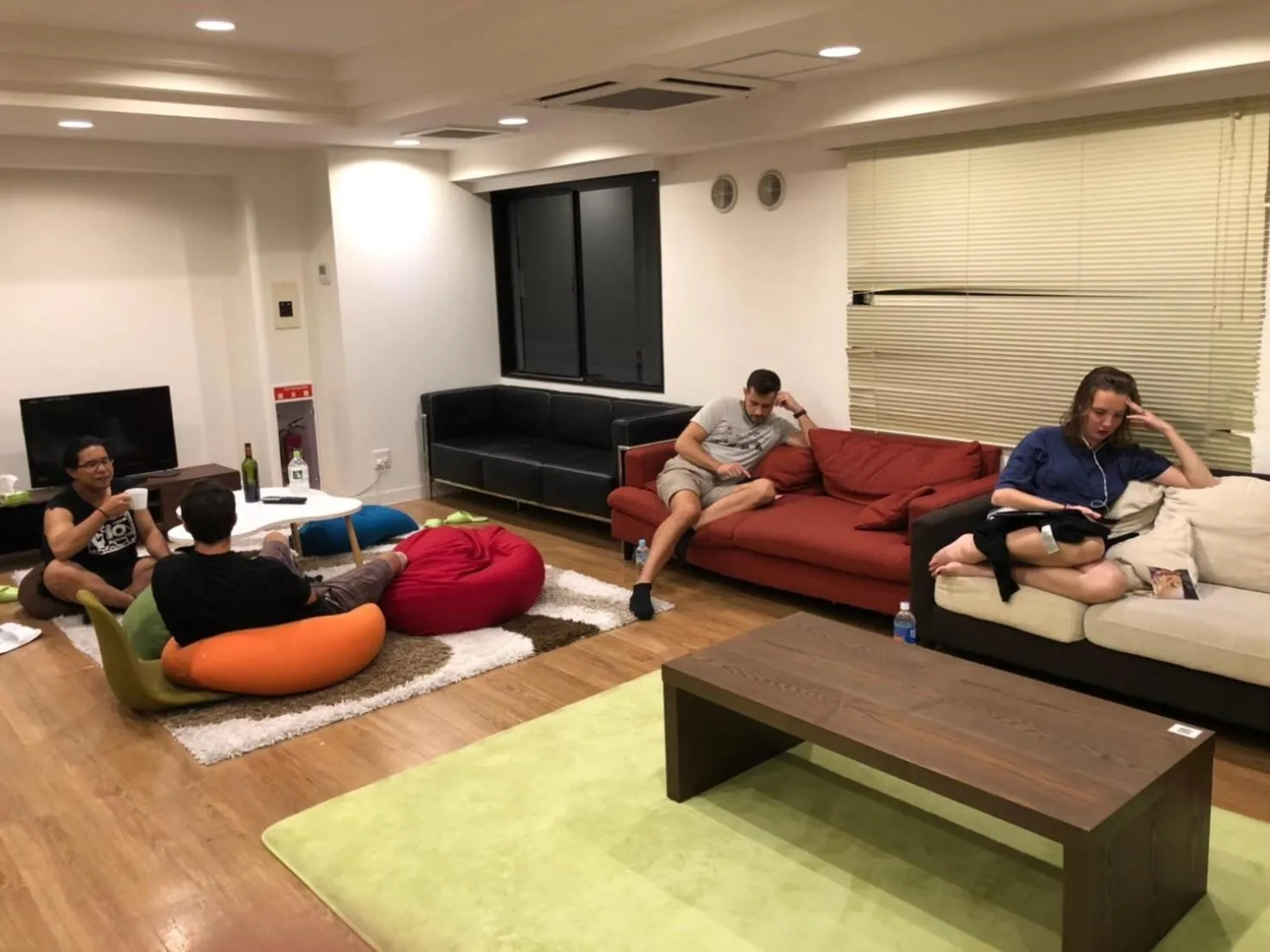 Communal lounge/ TV room in Guesthouse TOHO