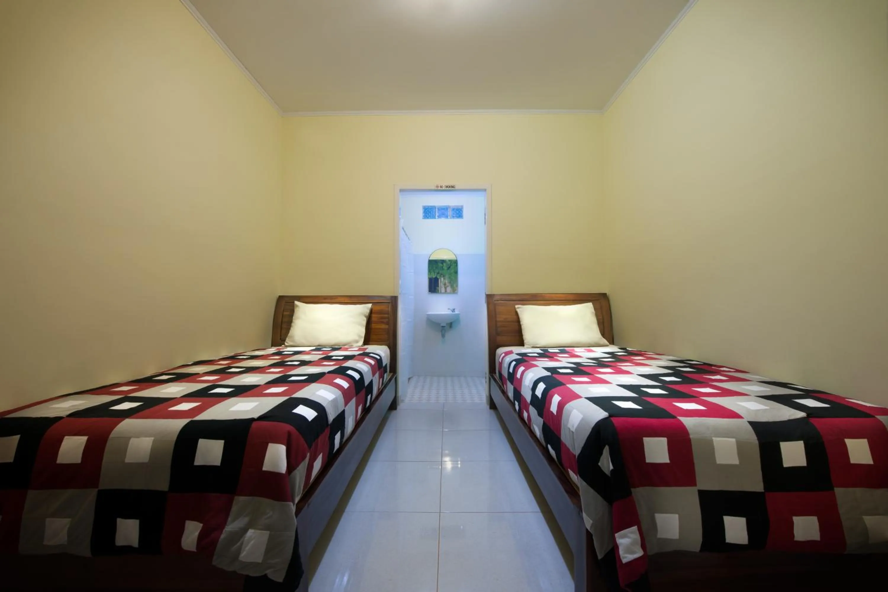 Photo of the whole room, Bed in Rinjani Garden Syariah by ecommerceloka