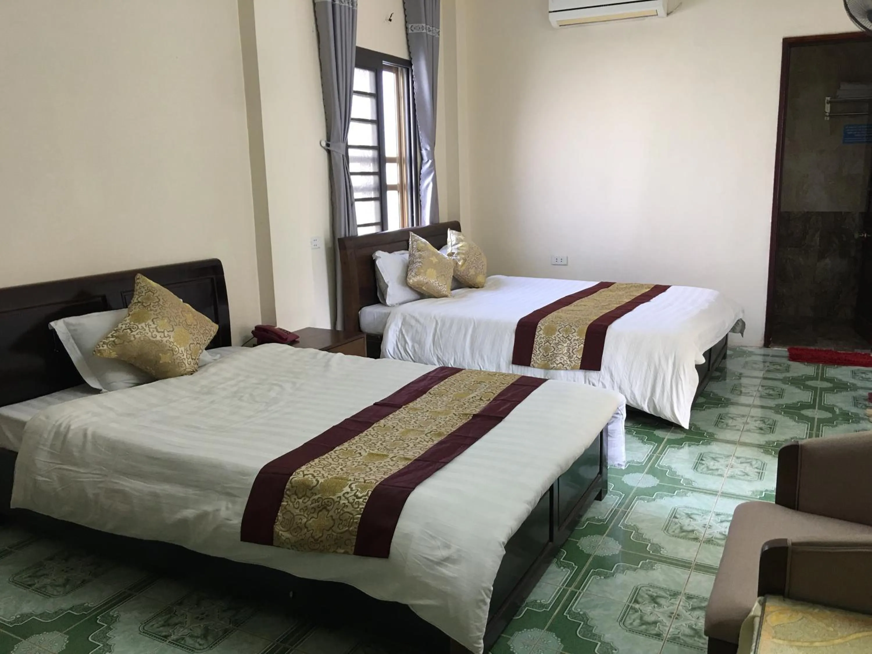 Bed in Hoang Ngoc Hotel