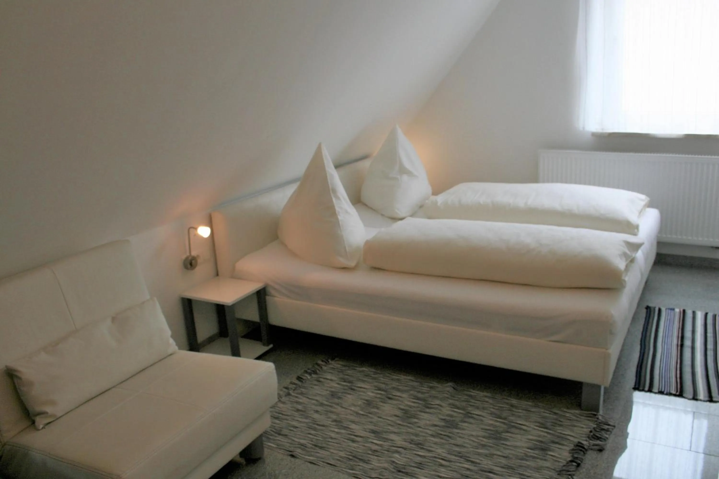 Bed in Haus zum Schlosspark