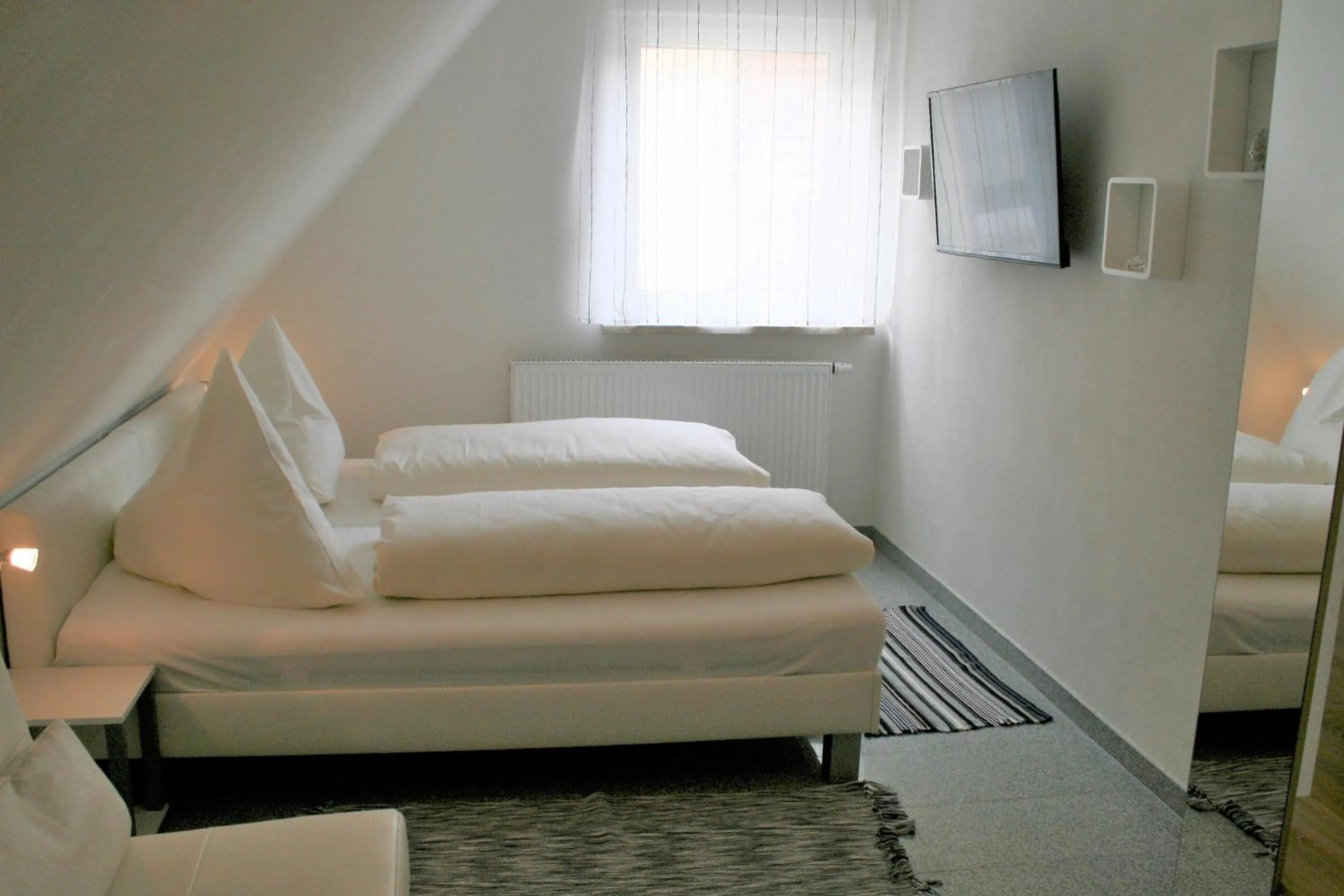 Bed in Haus zum Schlosspark