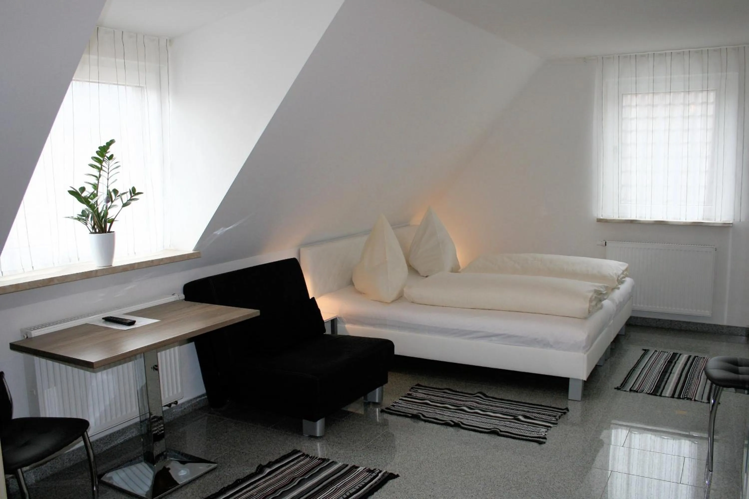 Bed in Haus zum Schlosspark