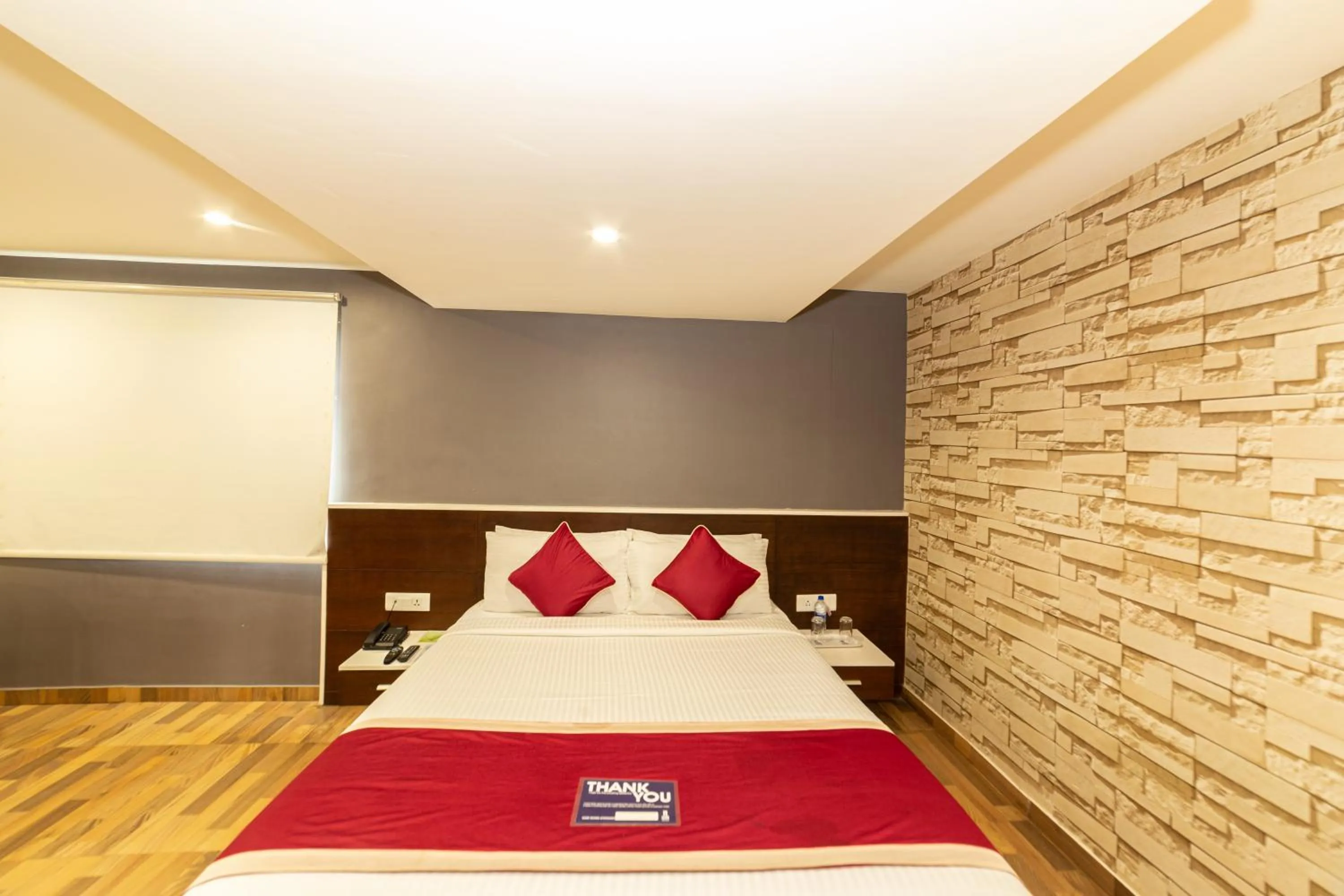 Bed in Icon Business Hotel by Bhagini