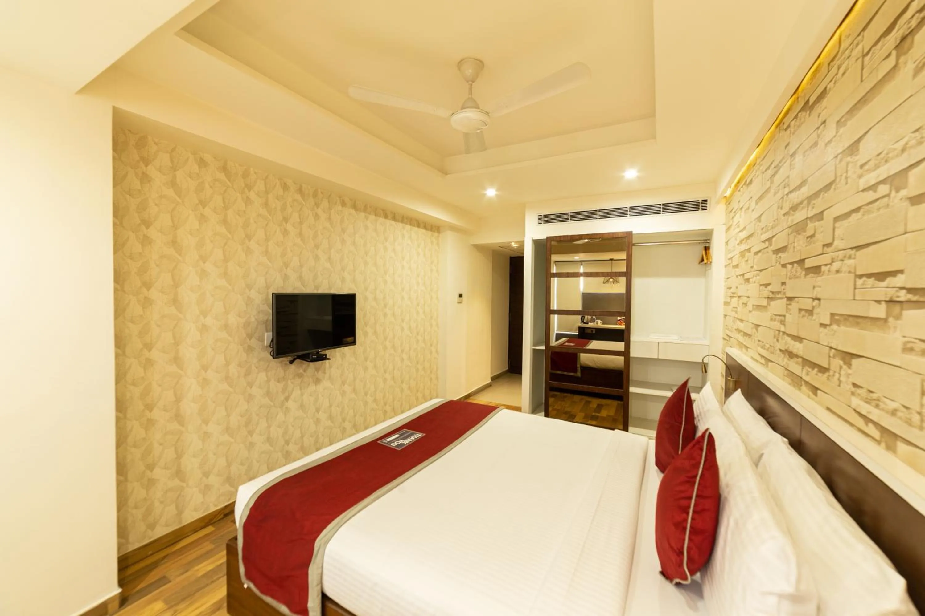 Bed in Icon Business Hotel by Bhagini