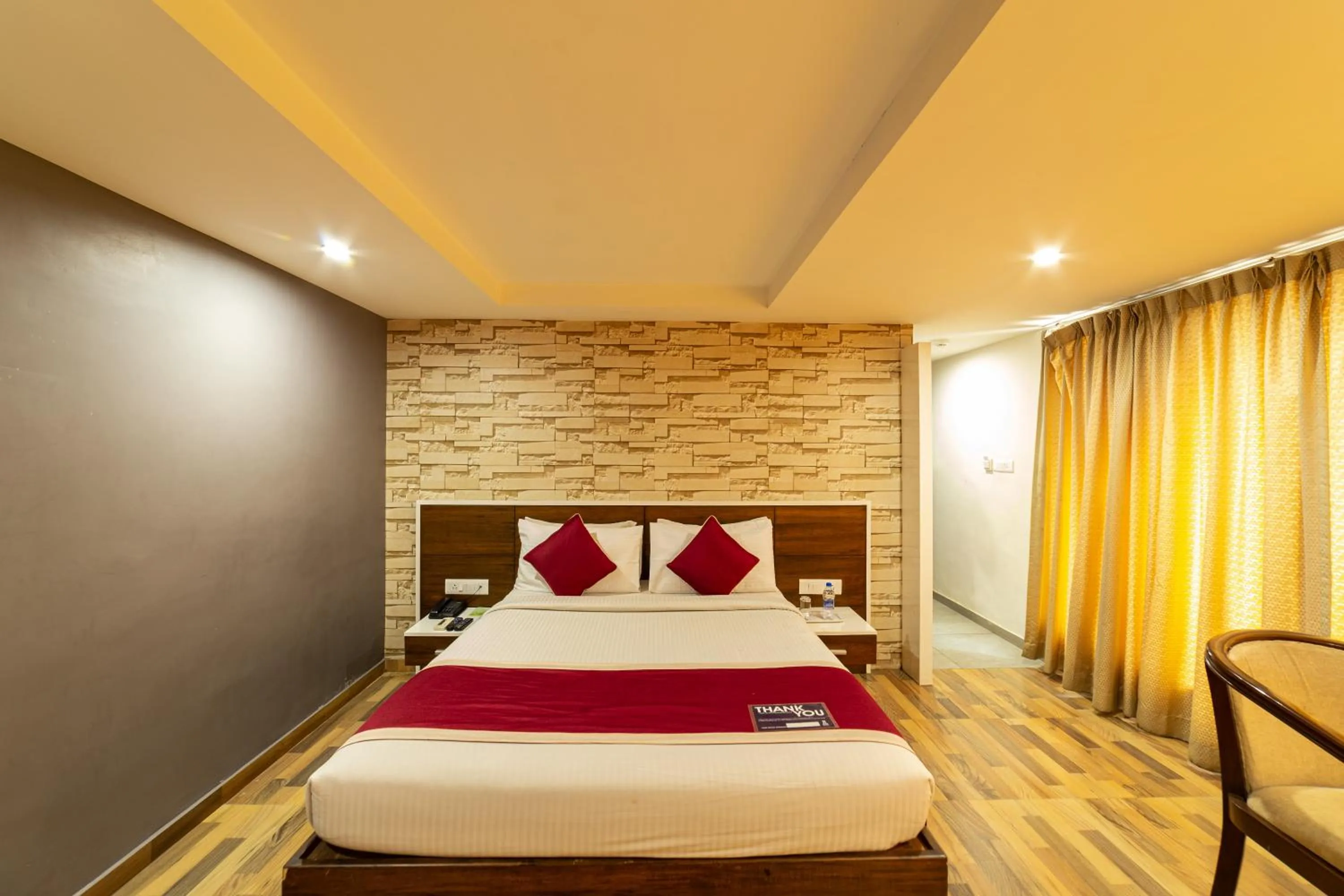 Bed in Icon Business Hotel by Bhagini