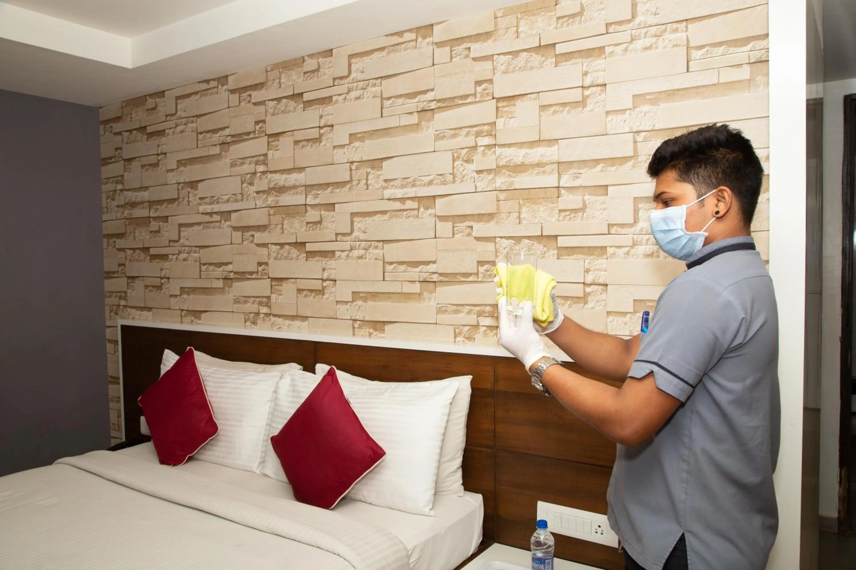 Bed in Icon Business Hotel by Bhagini