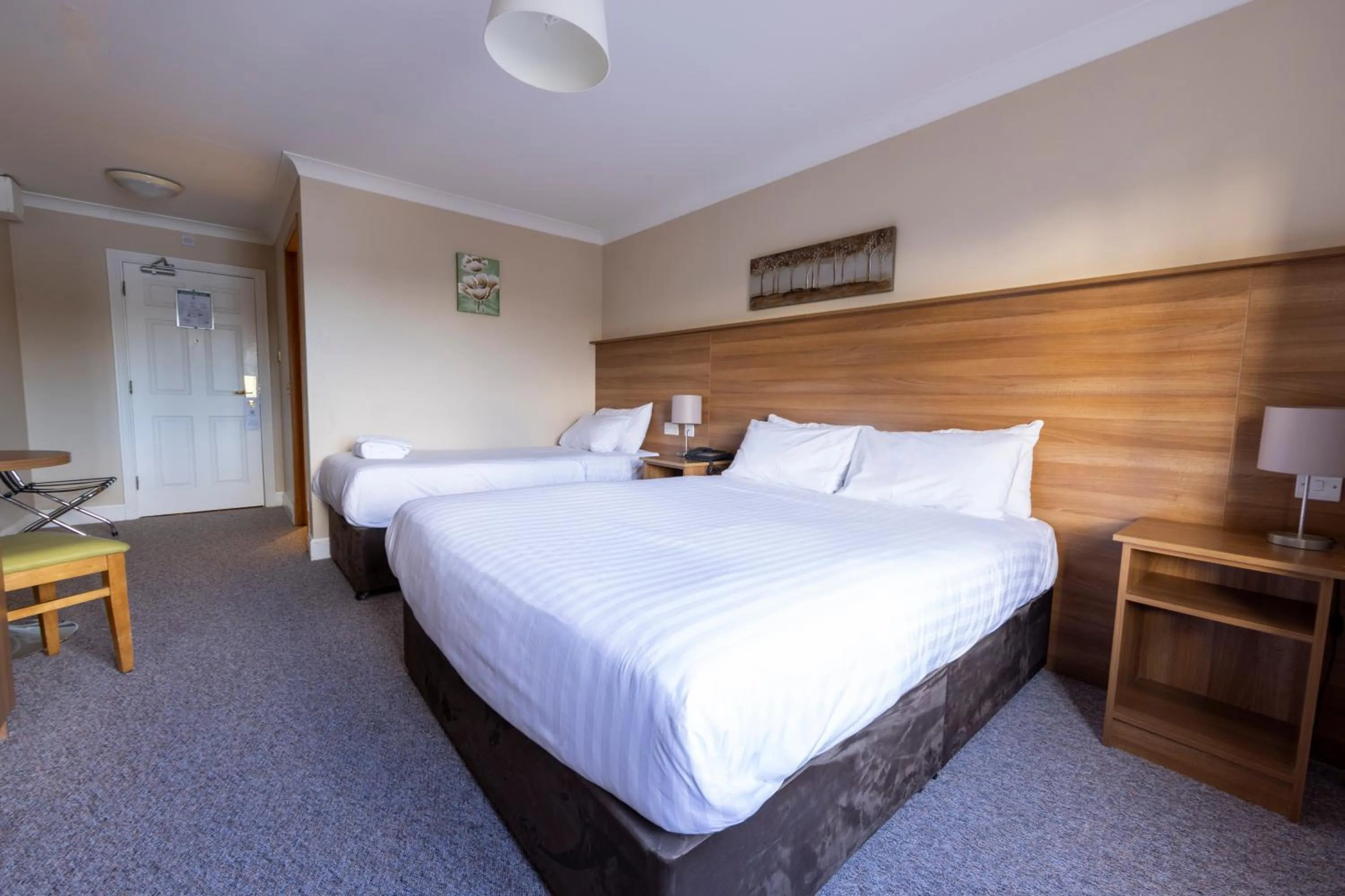 Bed in Riverside Hotel