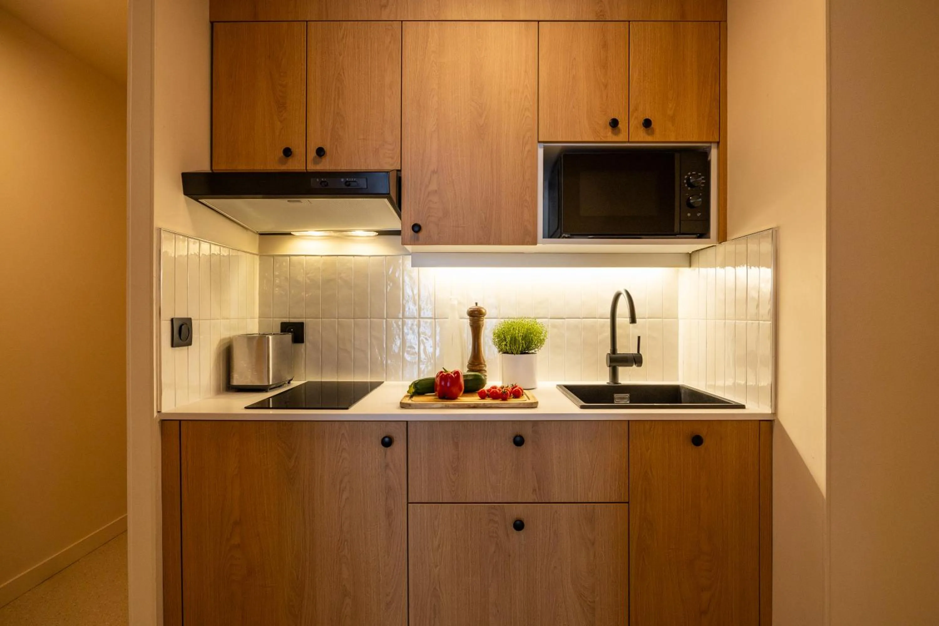 kitchen in Citadines République Paris