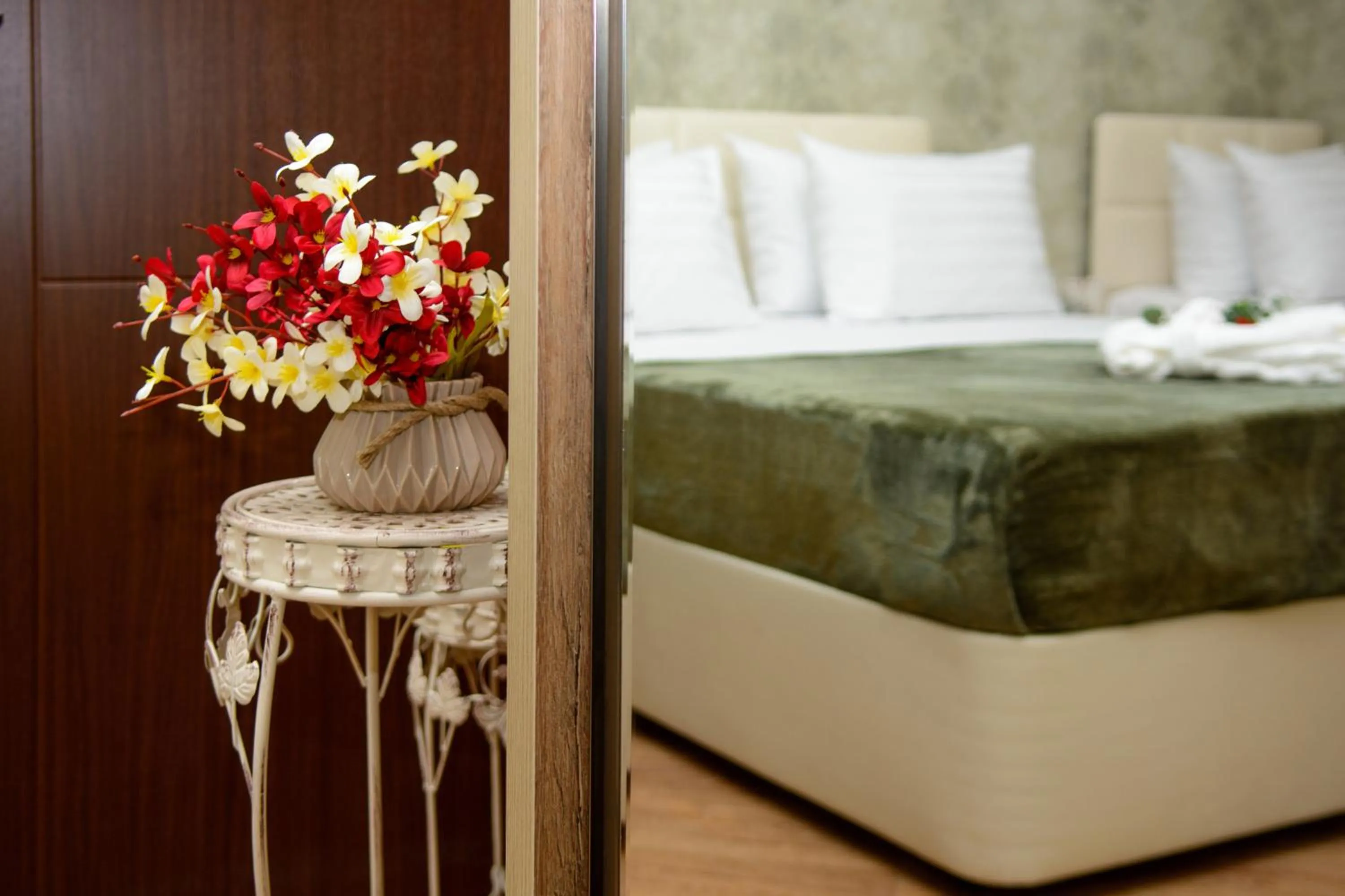 Decorative detail, Bed in Dat Exx Apartments on Marjanishvili