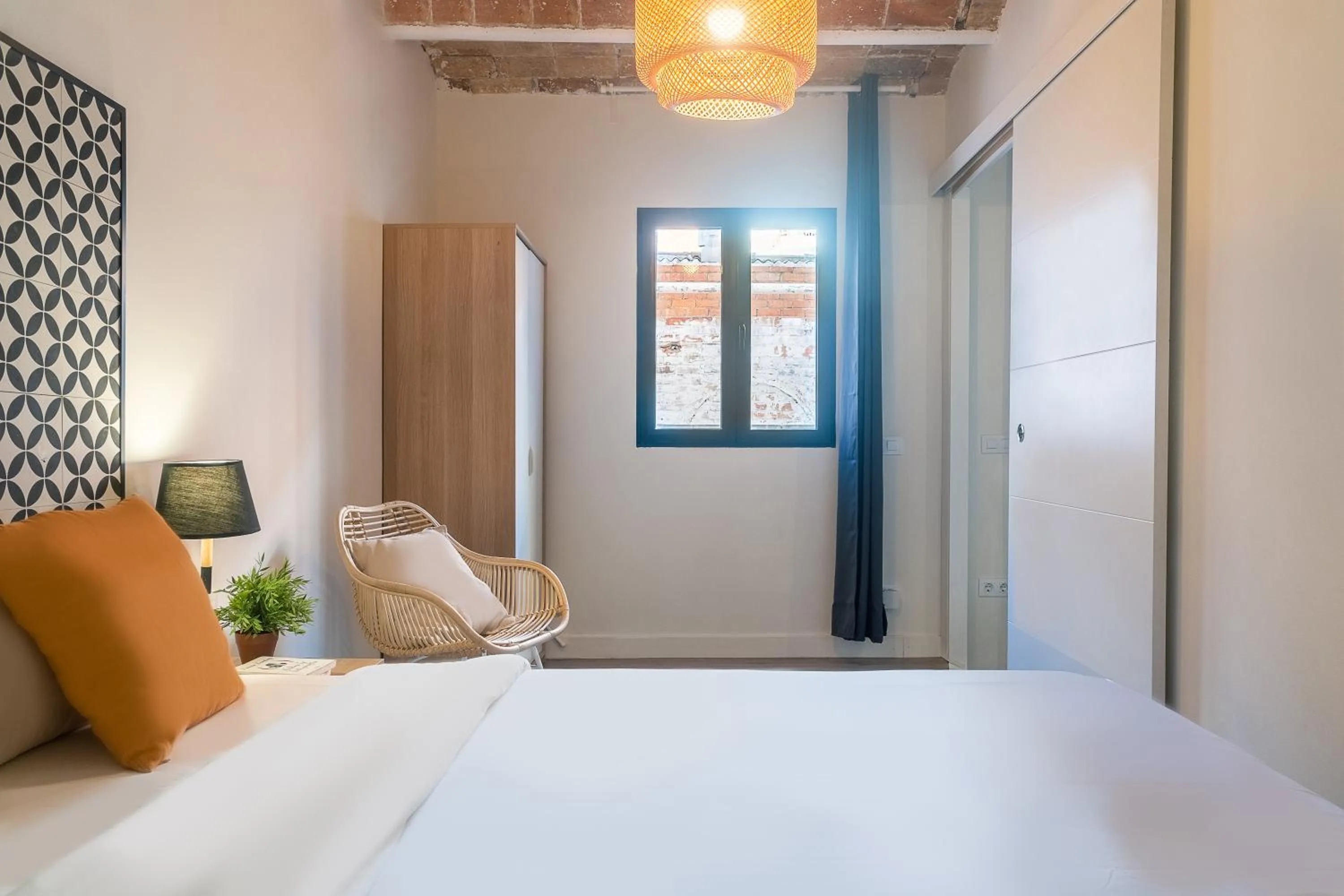 Bedroom, Bed in Modern Catalan Apartments by Olala Homes