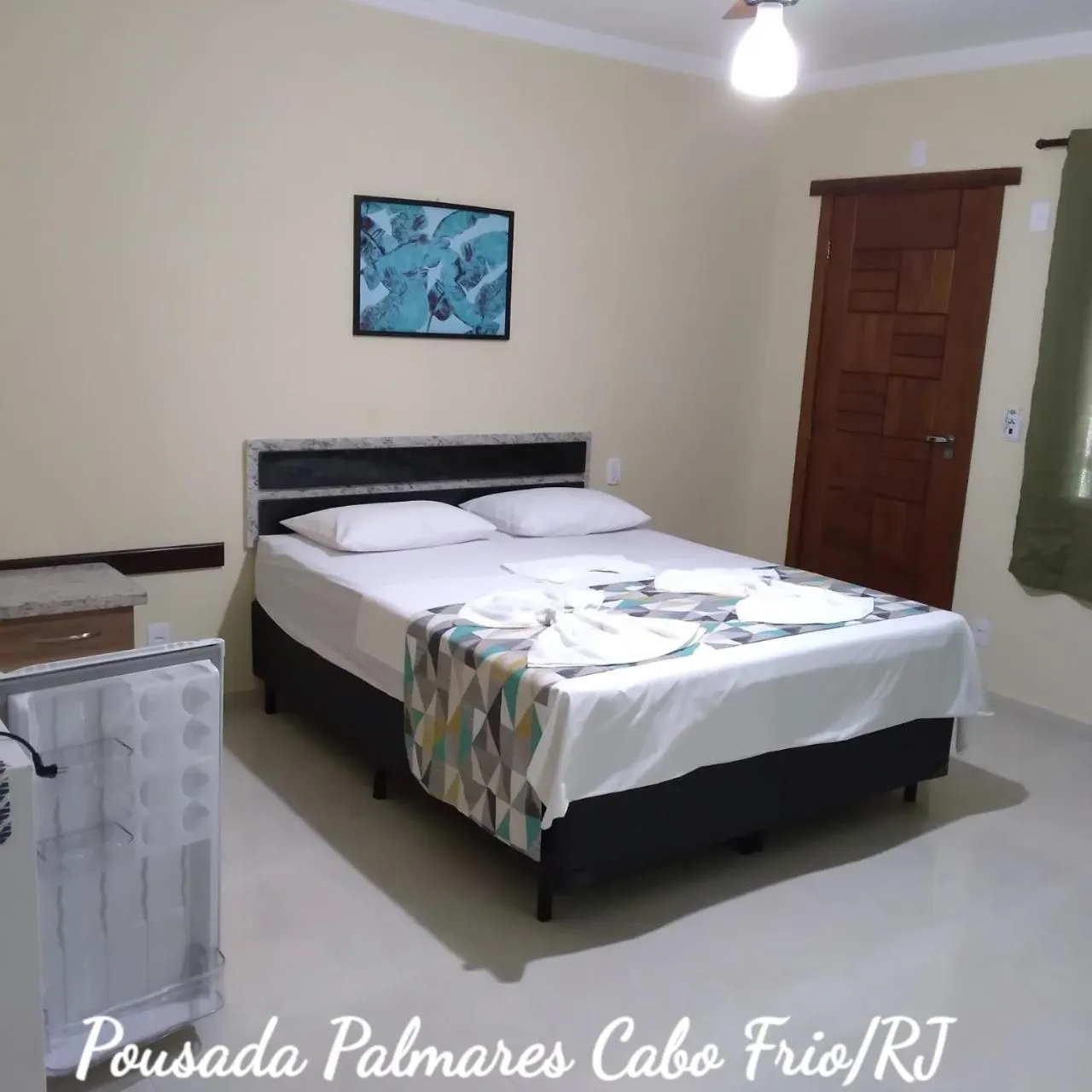 Bed in Pousada Palmares