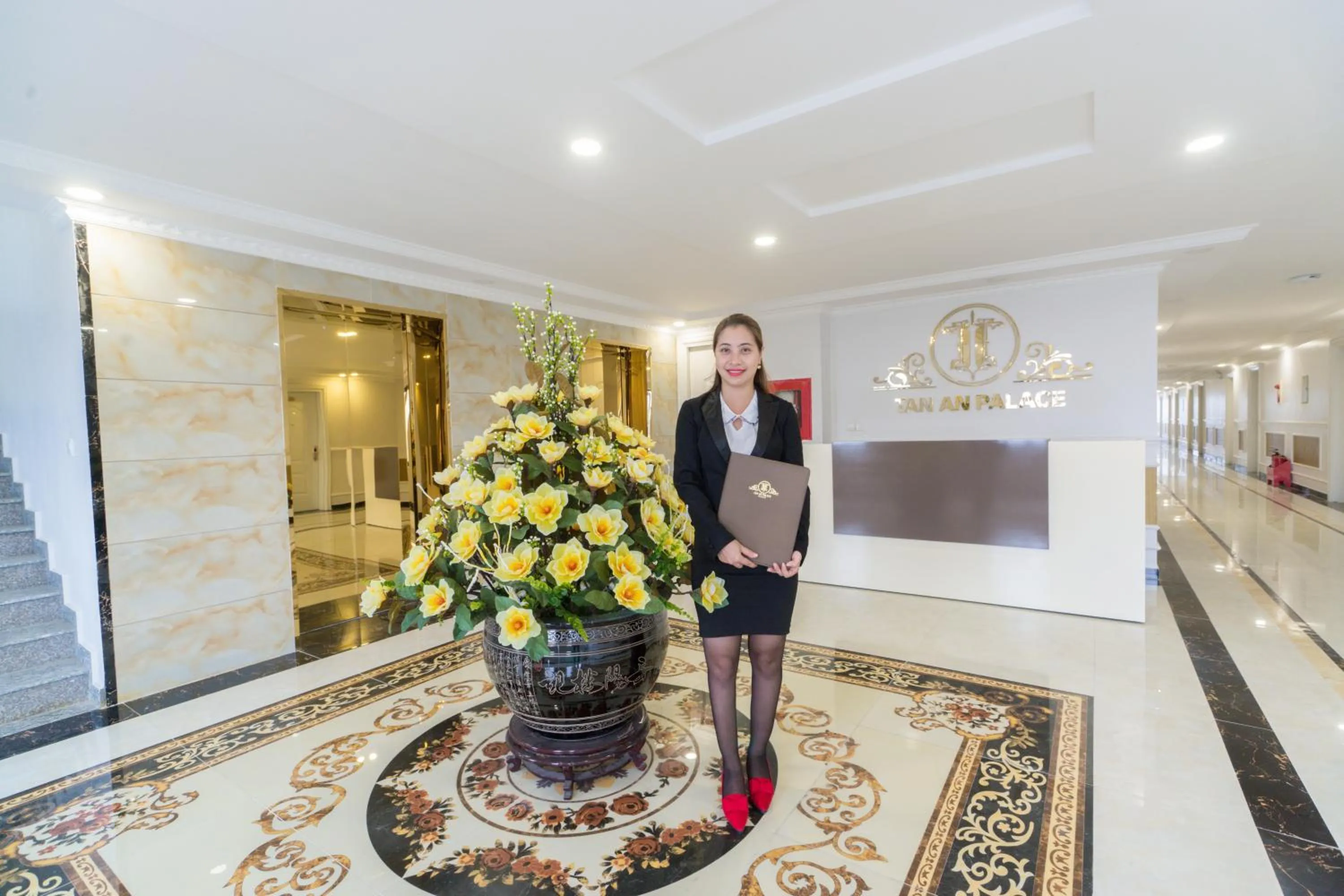 Staff in Tan An Palace