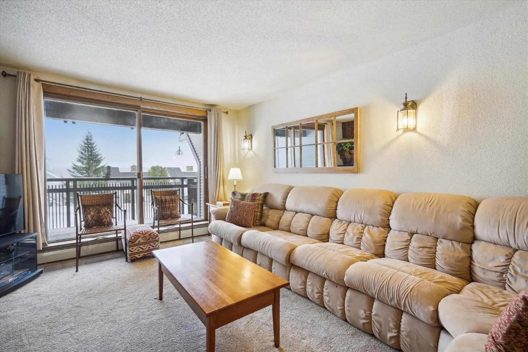 Living room in Ski on ski off, conveniently located, 2 bedroom condo with beautiful views, access to indoor pool Sunrise B3
