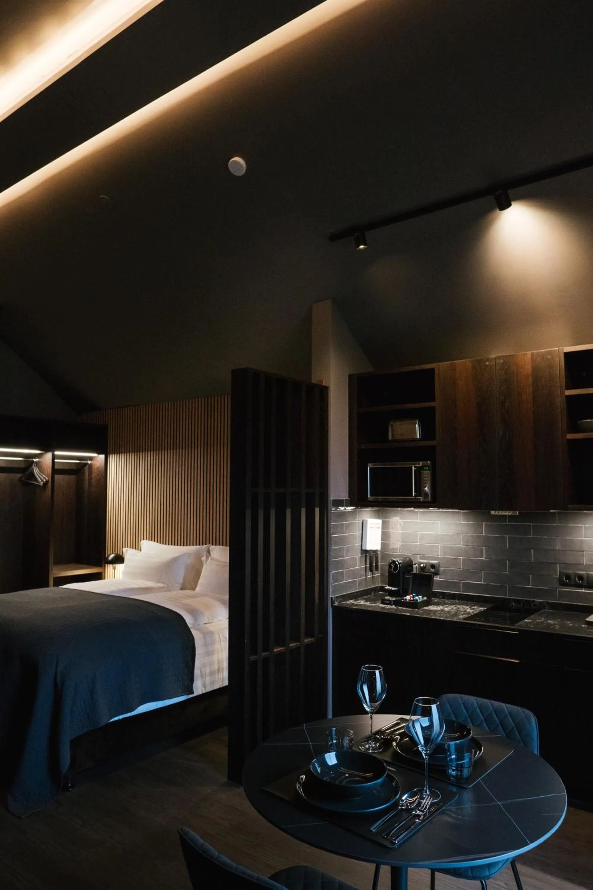 Bed in Black Beach Suites