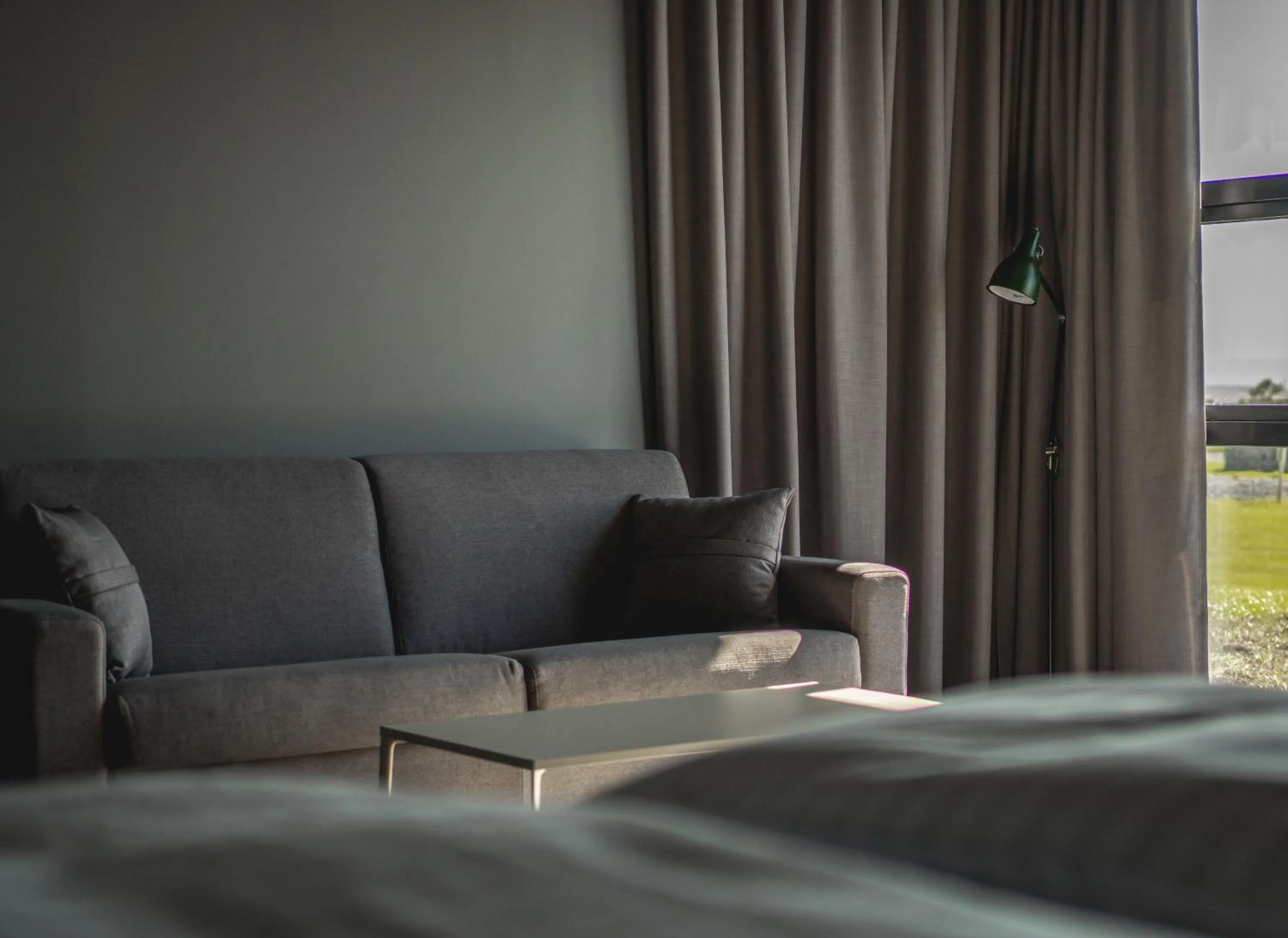 Bed in Black Beach Suites