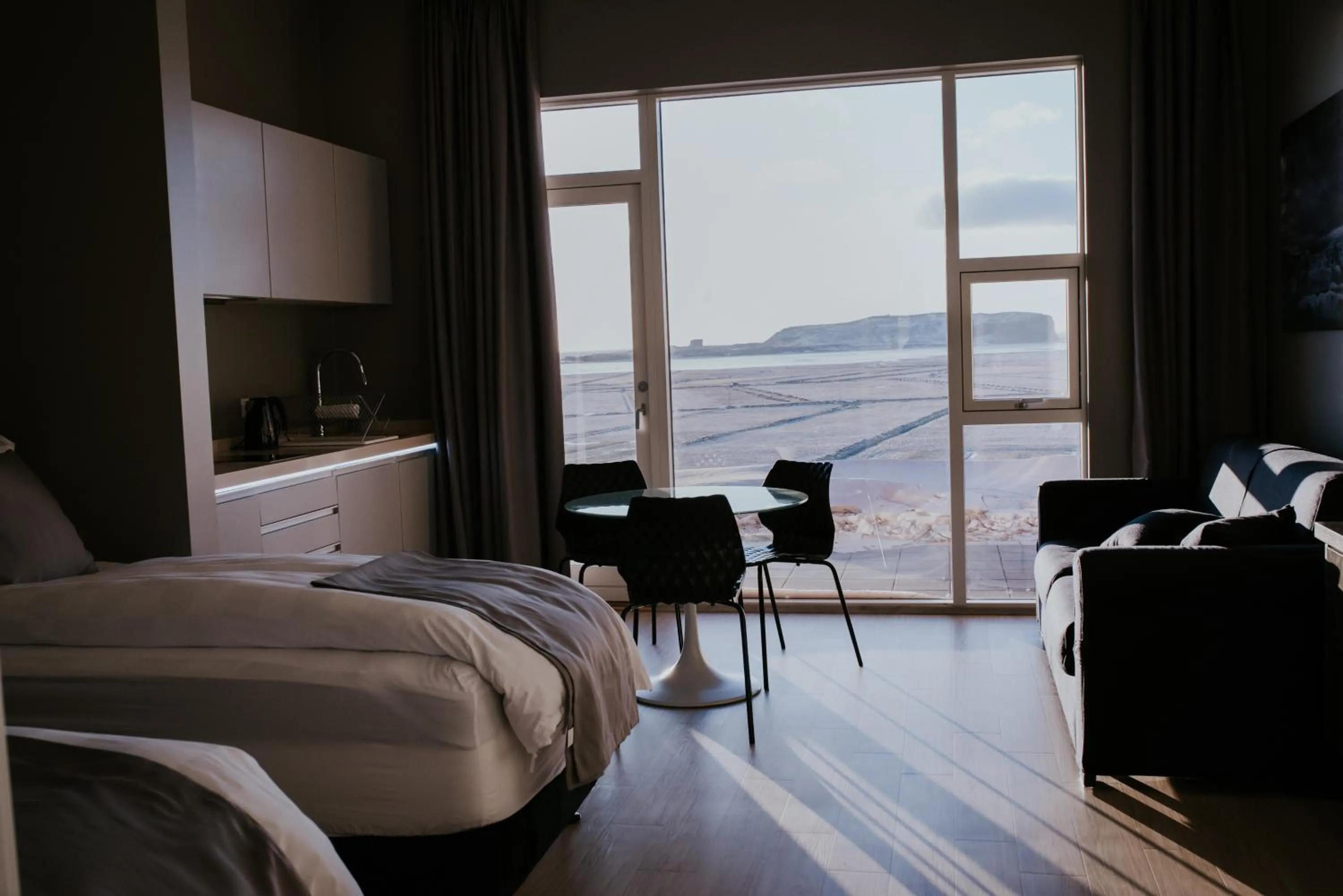 Bed in Black Beach Suites