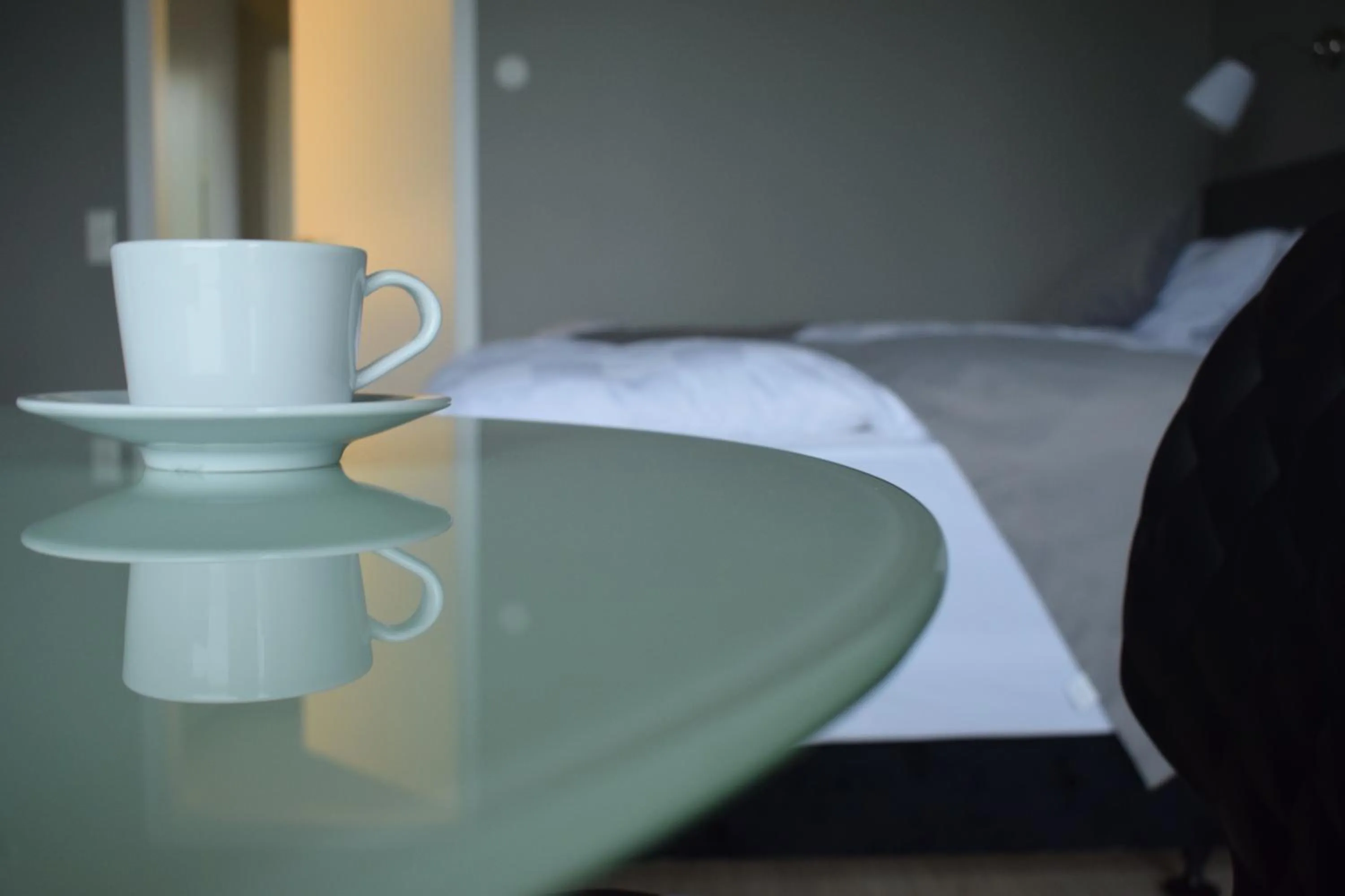 Bed in Black Beach Suites