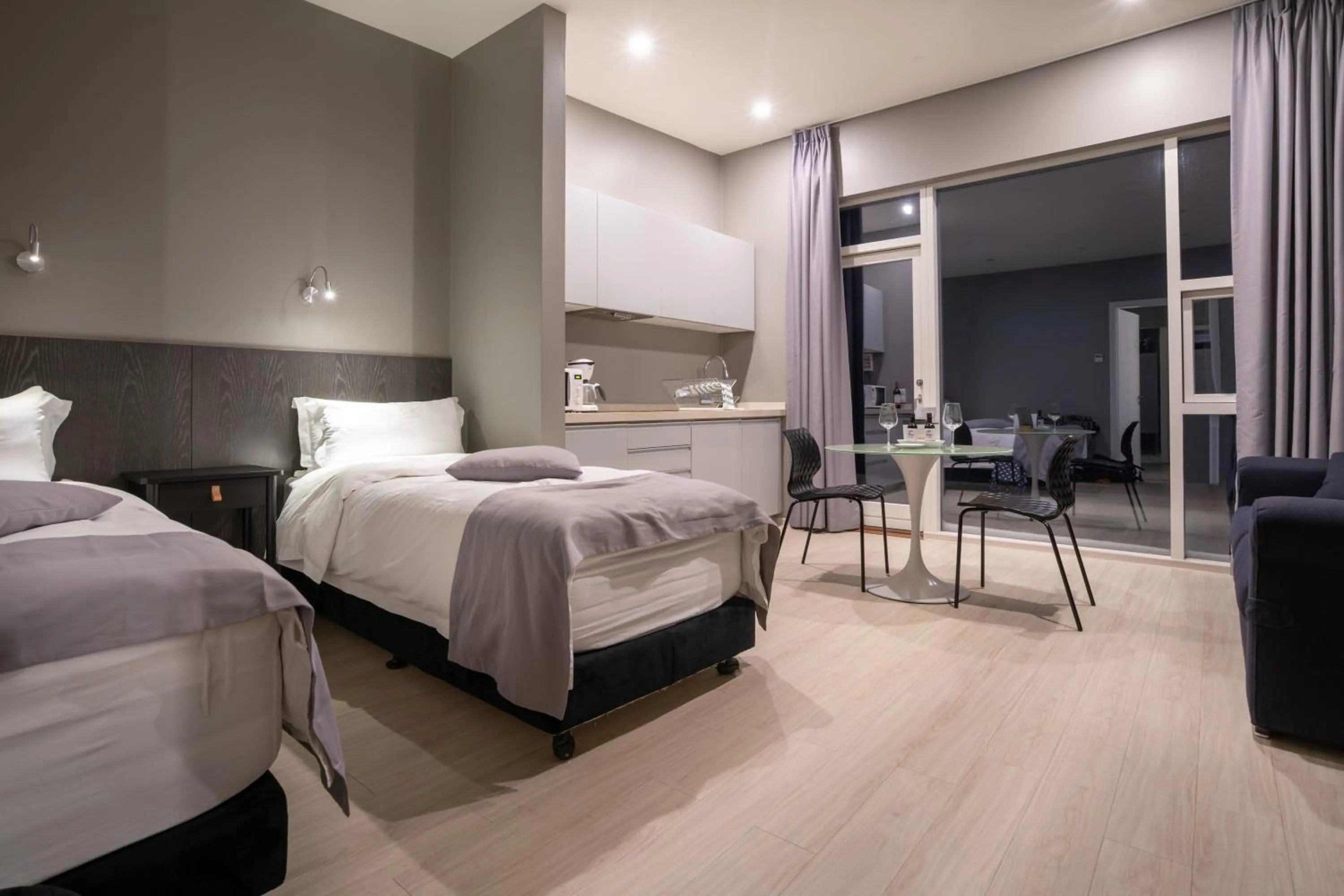 Bed in Black Beach Suites