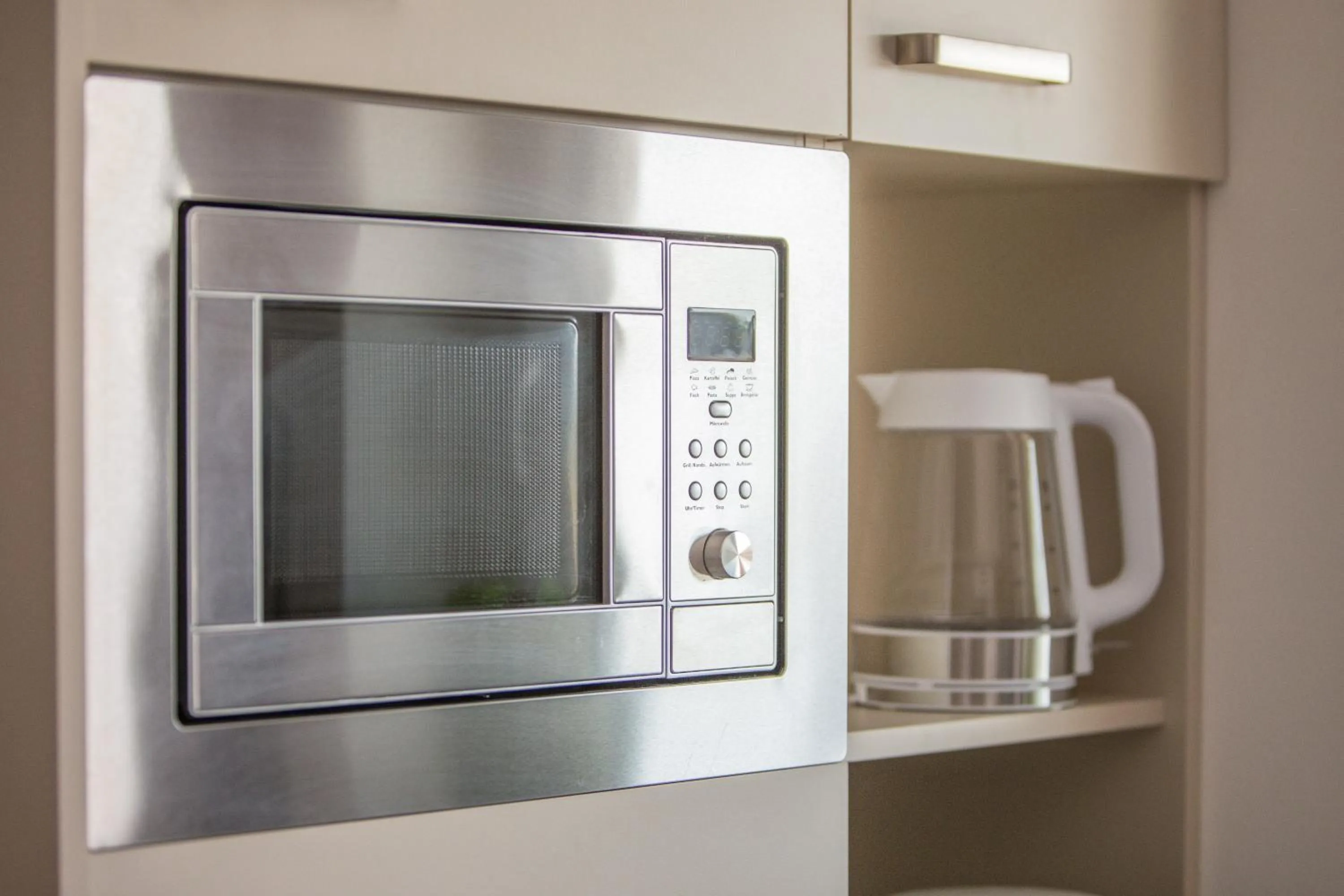 Kitchen or kitchenette in TRIO Apartment Hotel Berlin