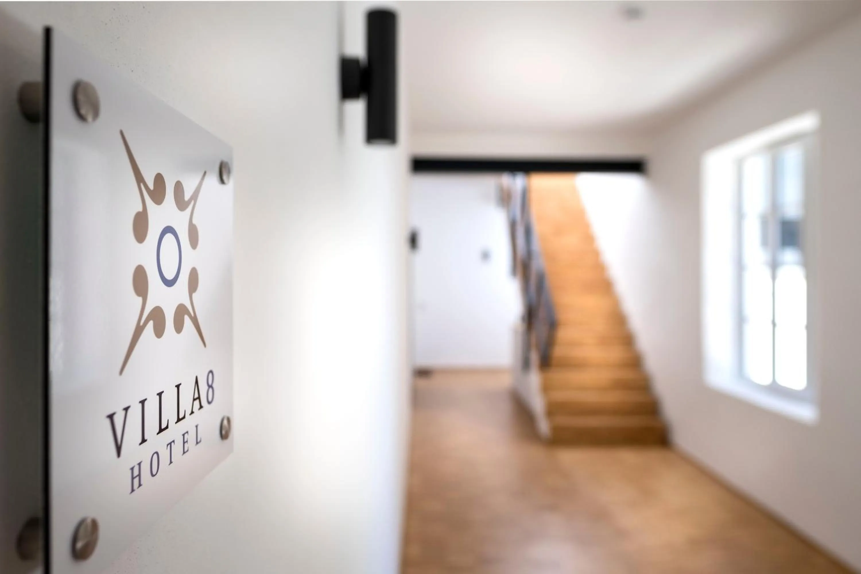 Property logo or sign in Hotel Villa8