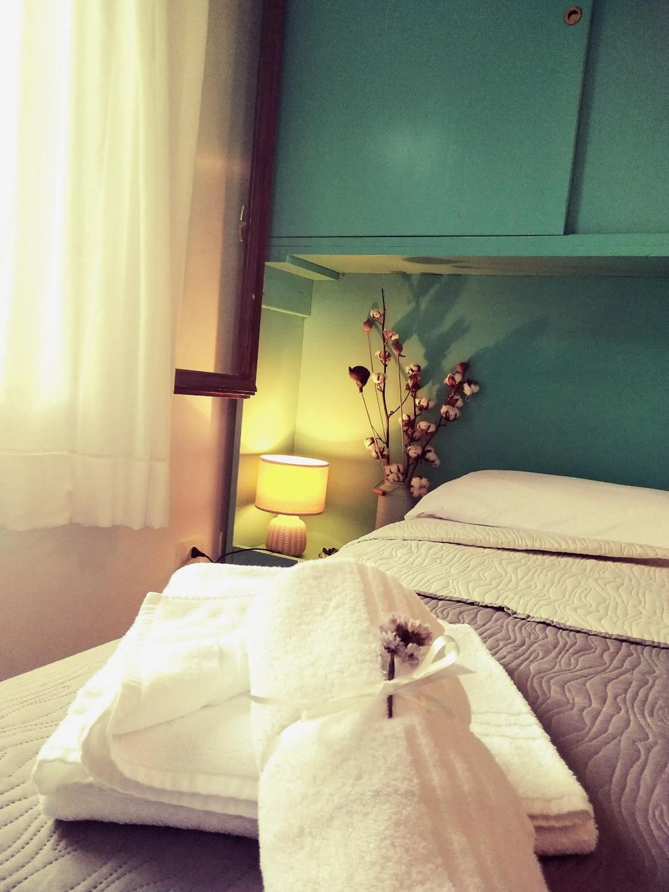 Photo of the whole room, Bed in Baia D'Oro