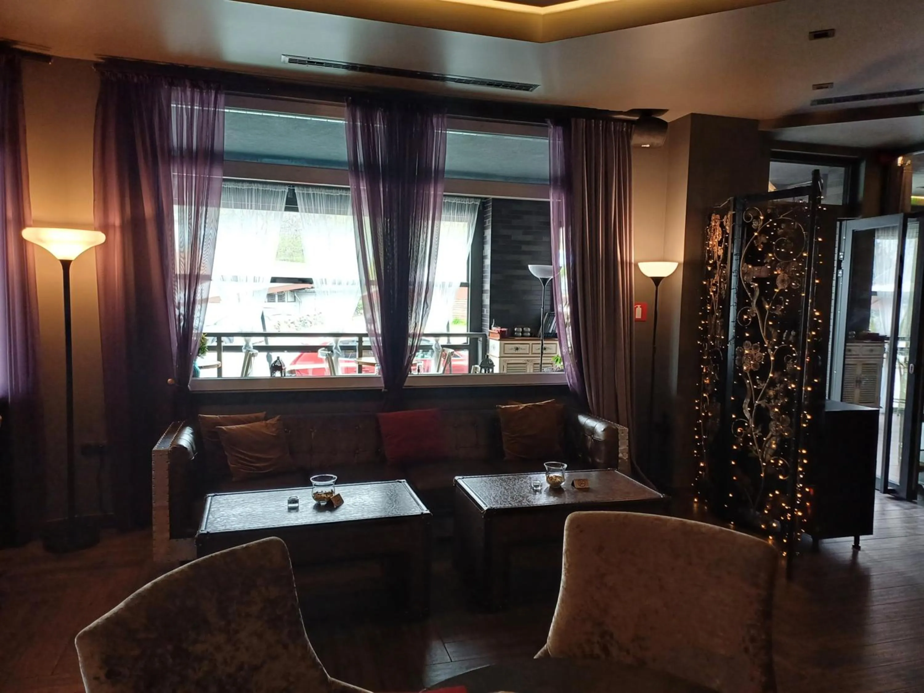 Lounge or bar in All Seasons Residence Design Hotel - Free parking