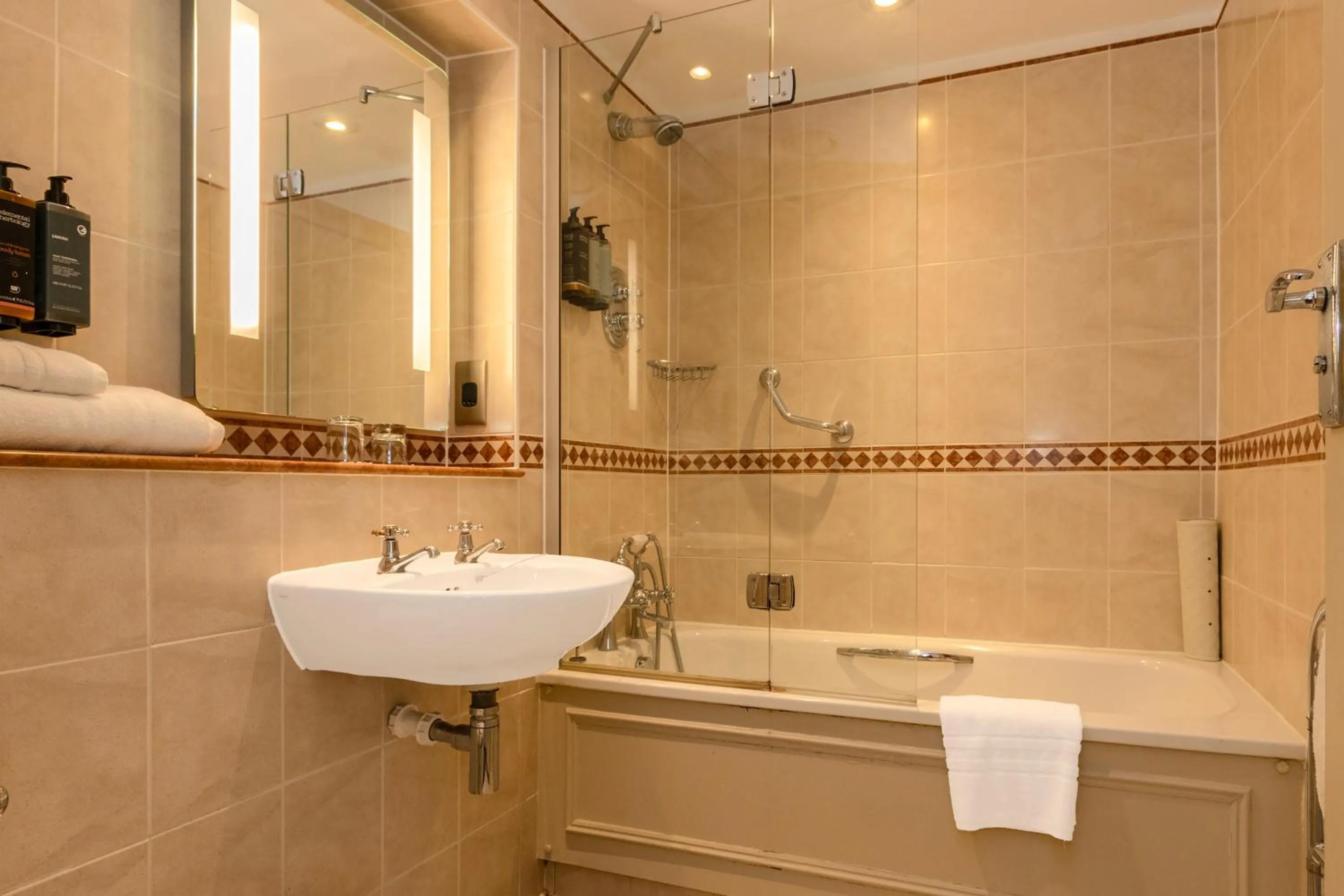 Bathroom in Winchester Wessex Hotel by Sunday