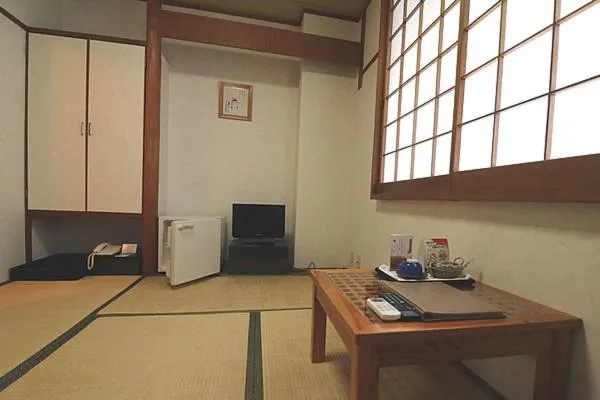 Photo of the whole room, TV/Entertainment Center in Hotel Zurich Toho 2001