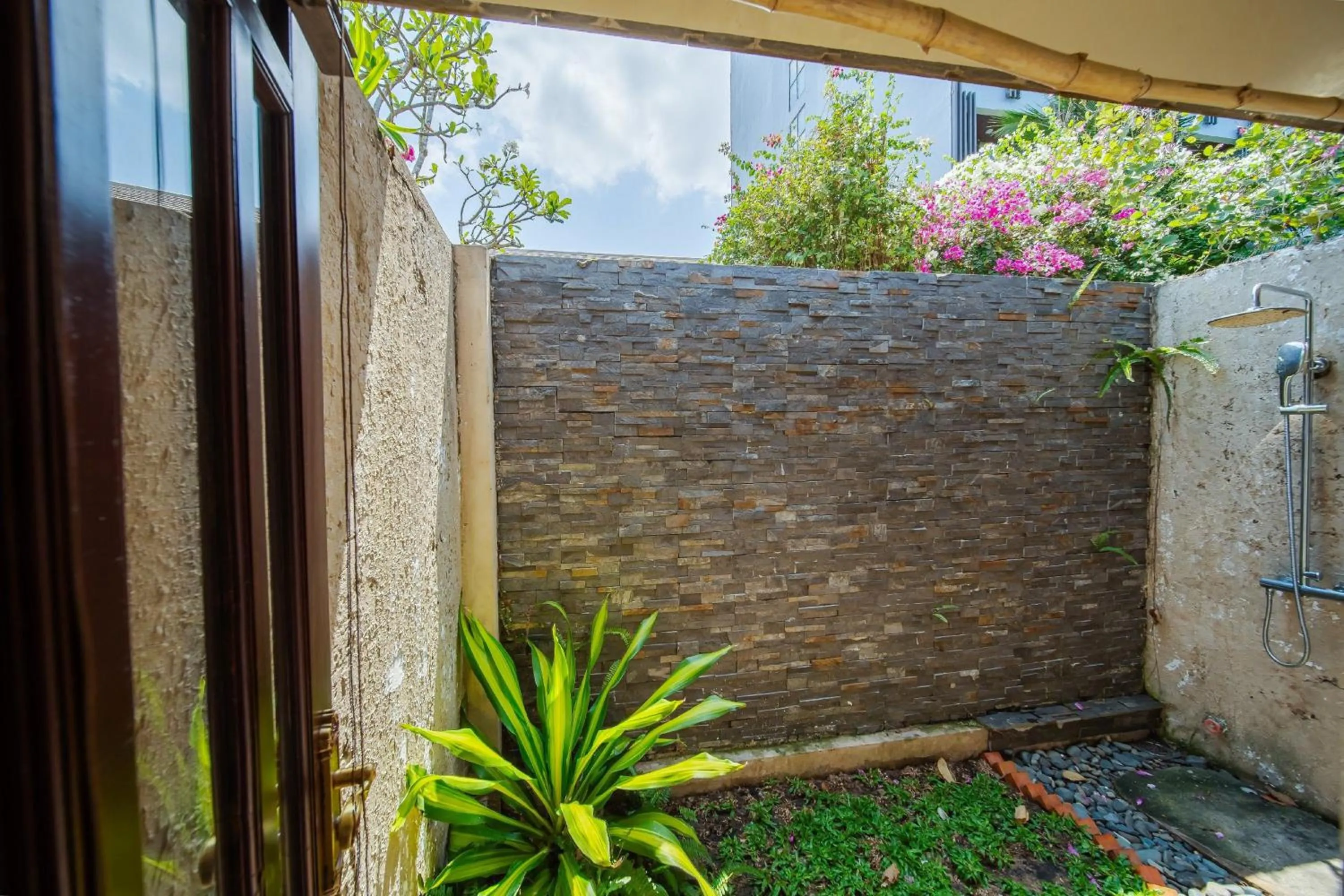 Shower in Anja Beach Resort & Spa