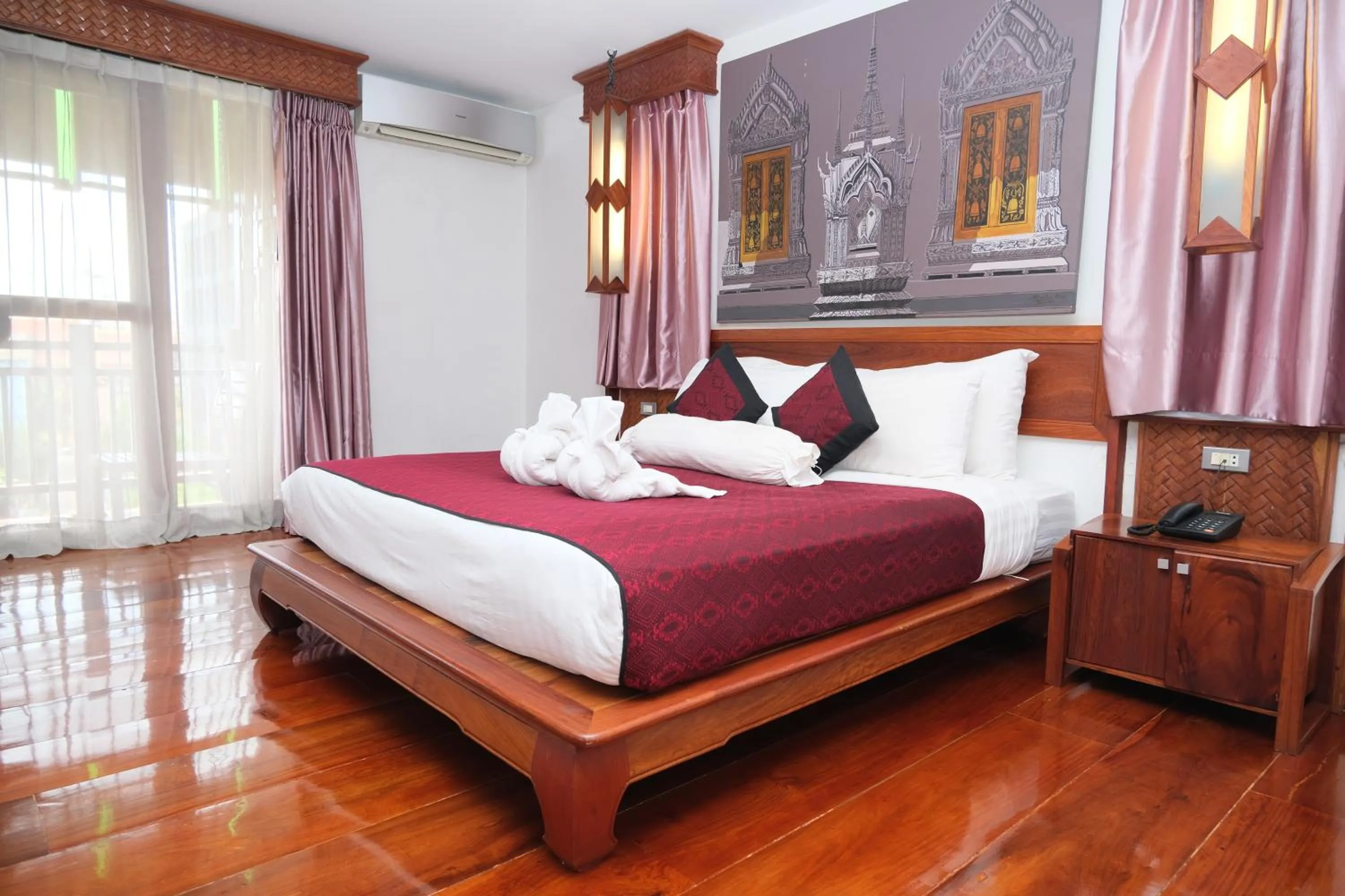 Bed in Chanthapanya Hotel