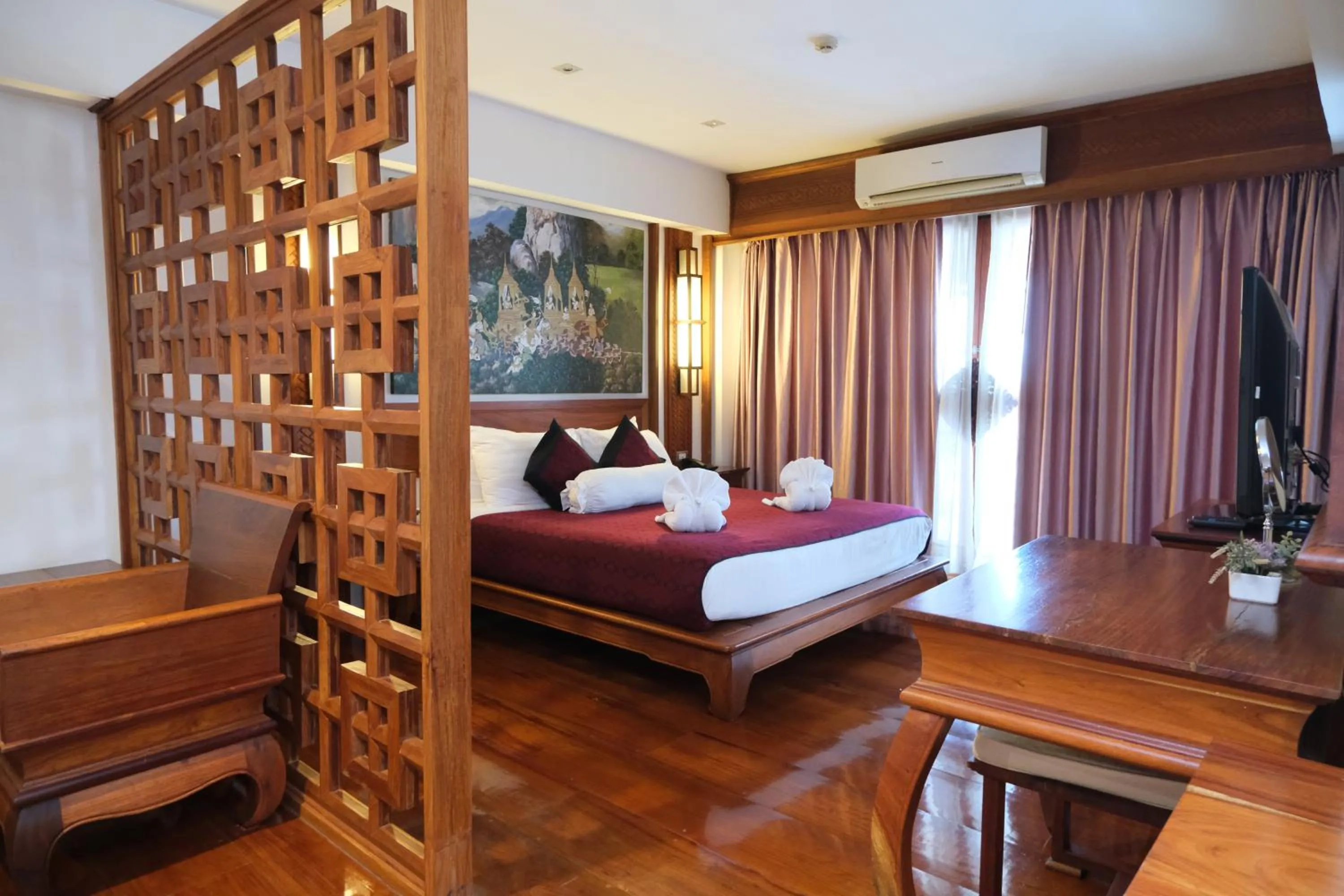 Bed in Chanthapanya Hotel