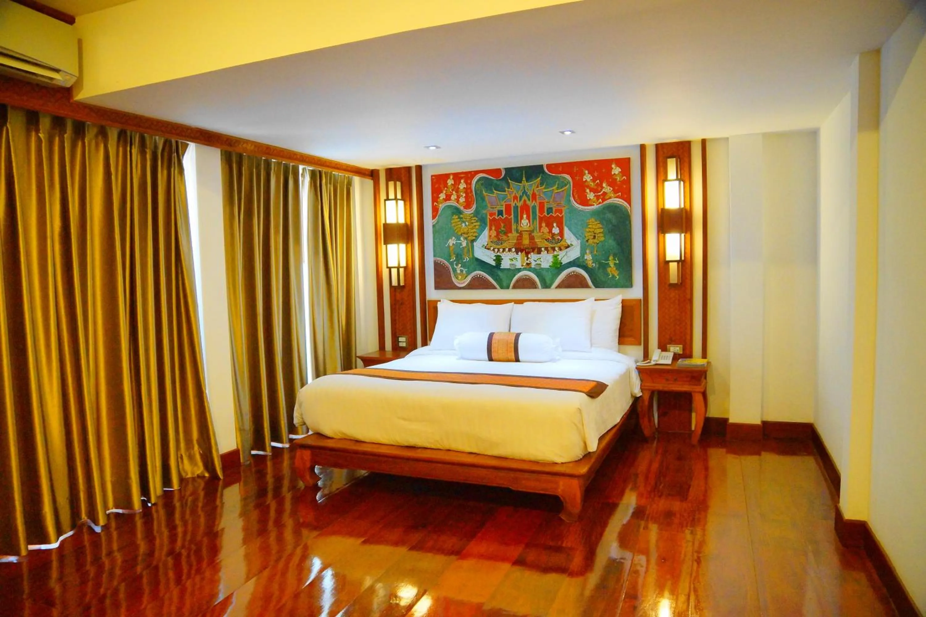 Bed in Chanthapanya Hotel
